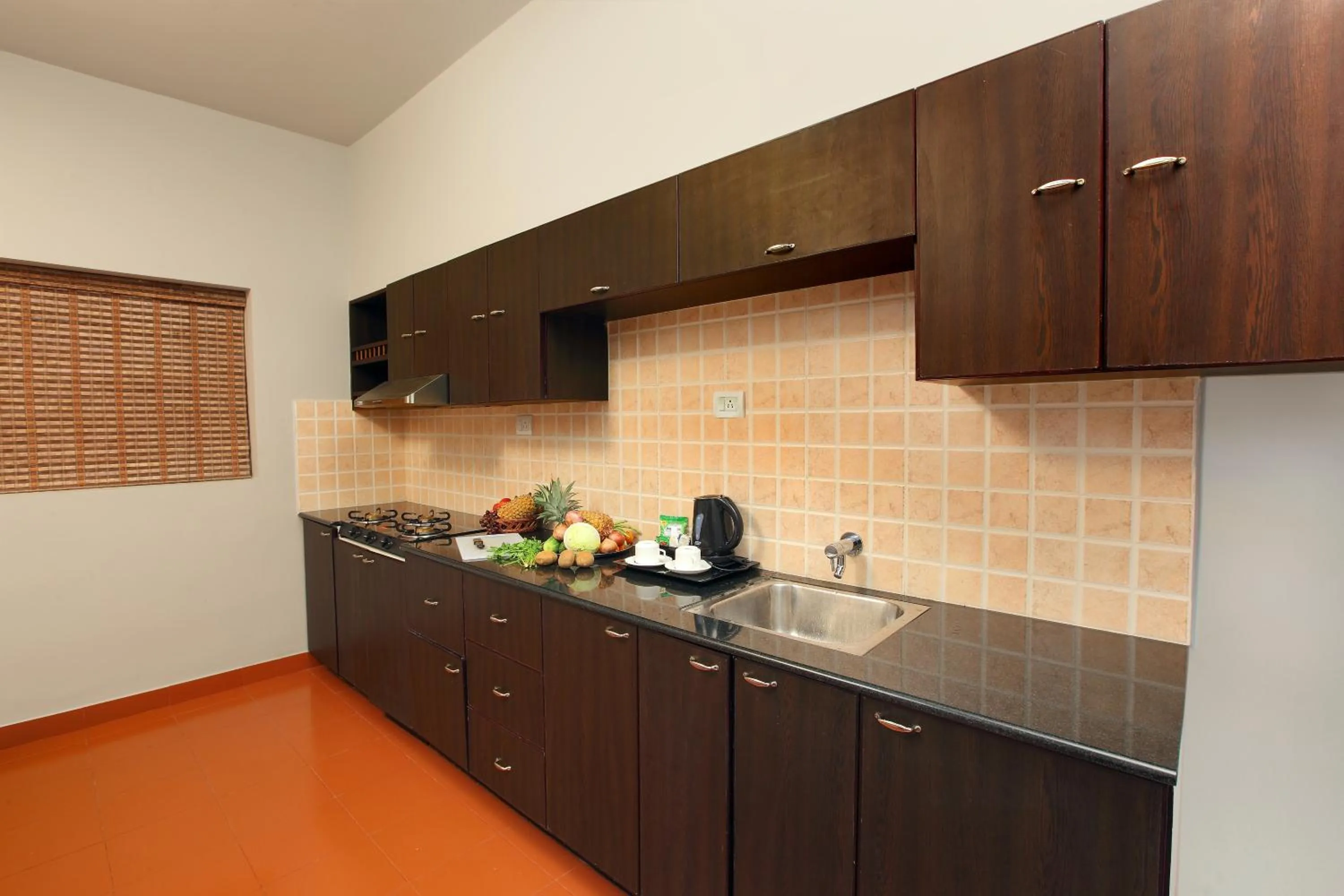 Communal kitchen in The River Retreat Heritage Ayurvedic Resort