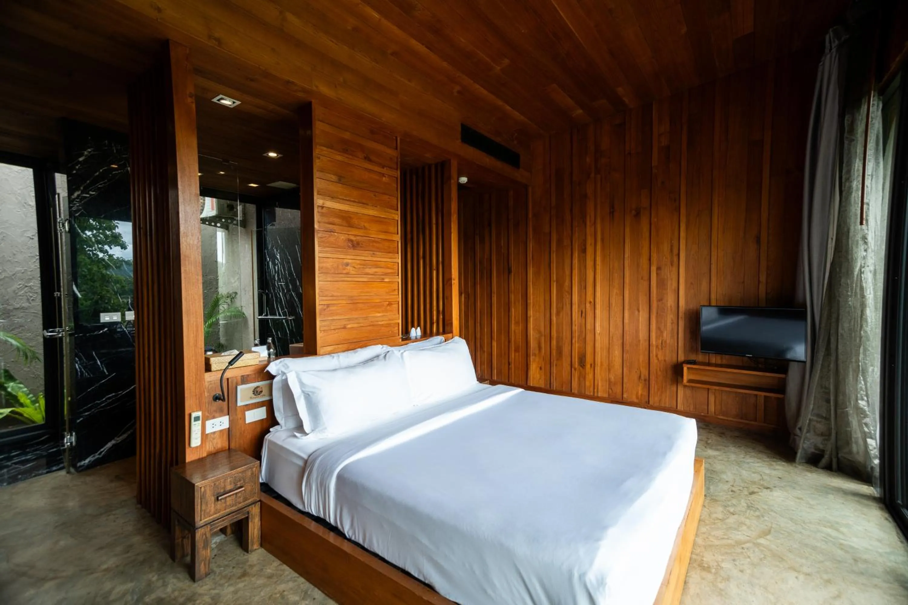 Bed in Puripai Villa Wellness & Retreat