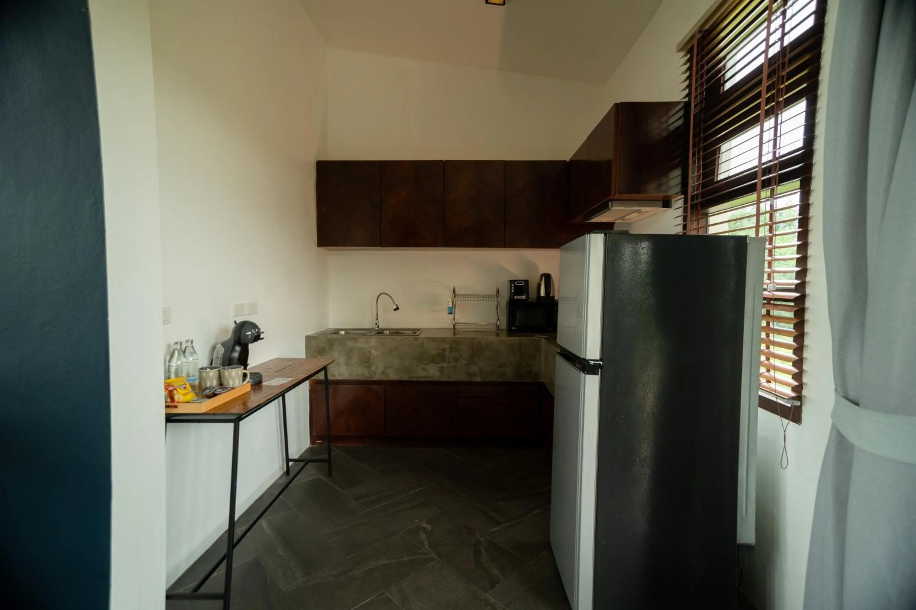 kitchen in Puripai Villa Wellness & Retreat