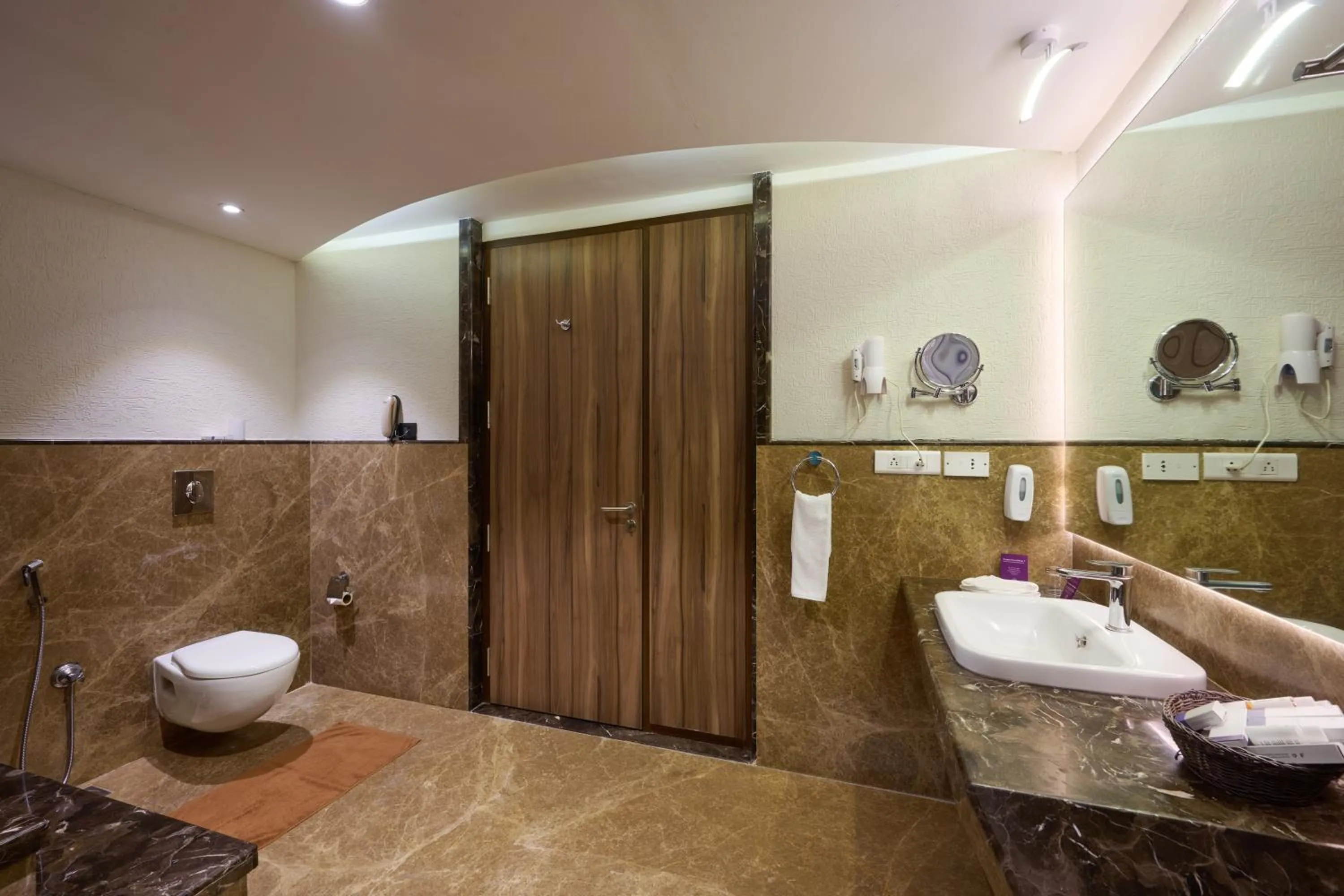 Toilet in Flora Airport Hotel and Convention Centre Kochi