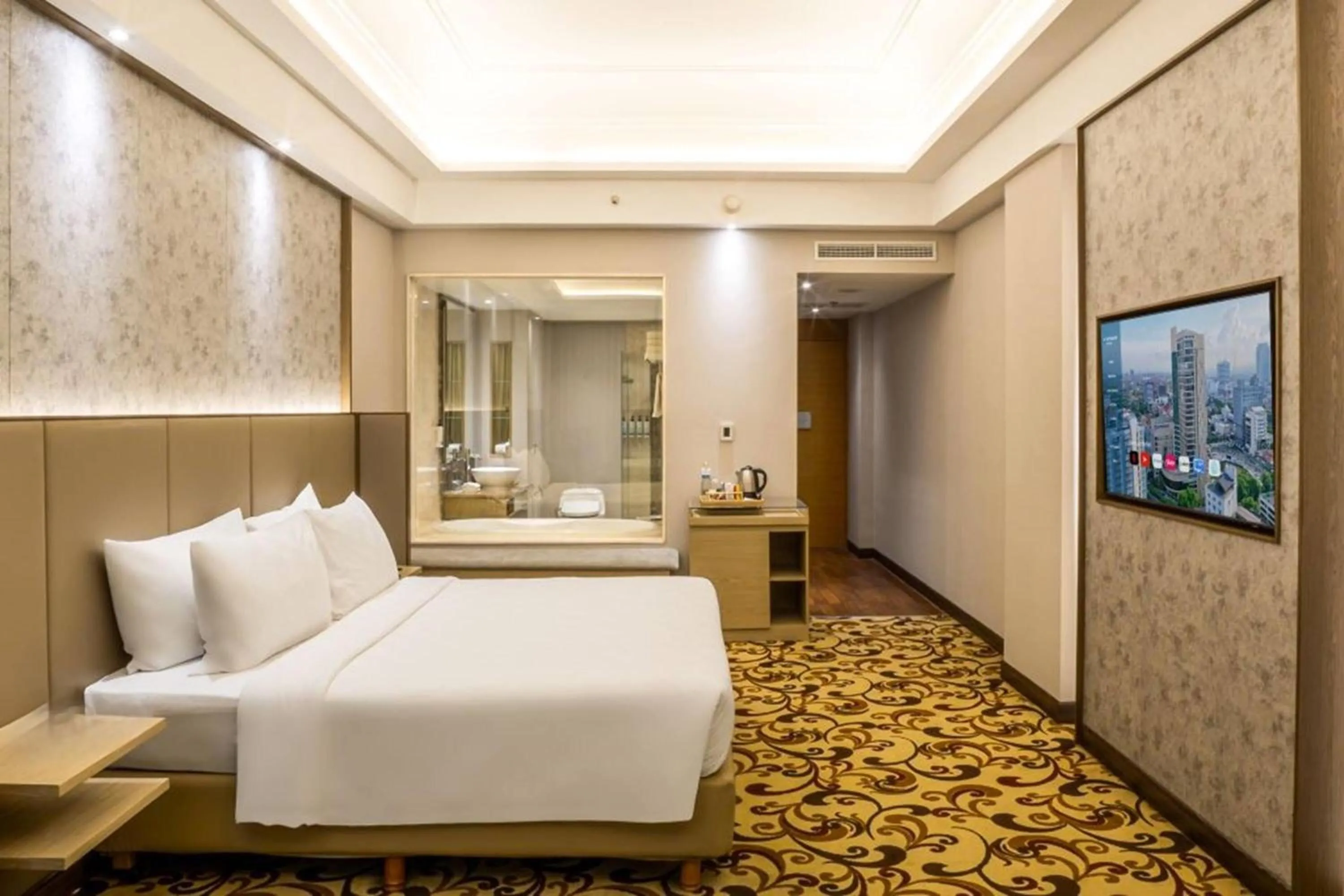 Photo of the whole room, Bed in Wyndham Surabaya