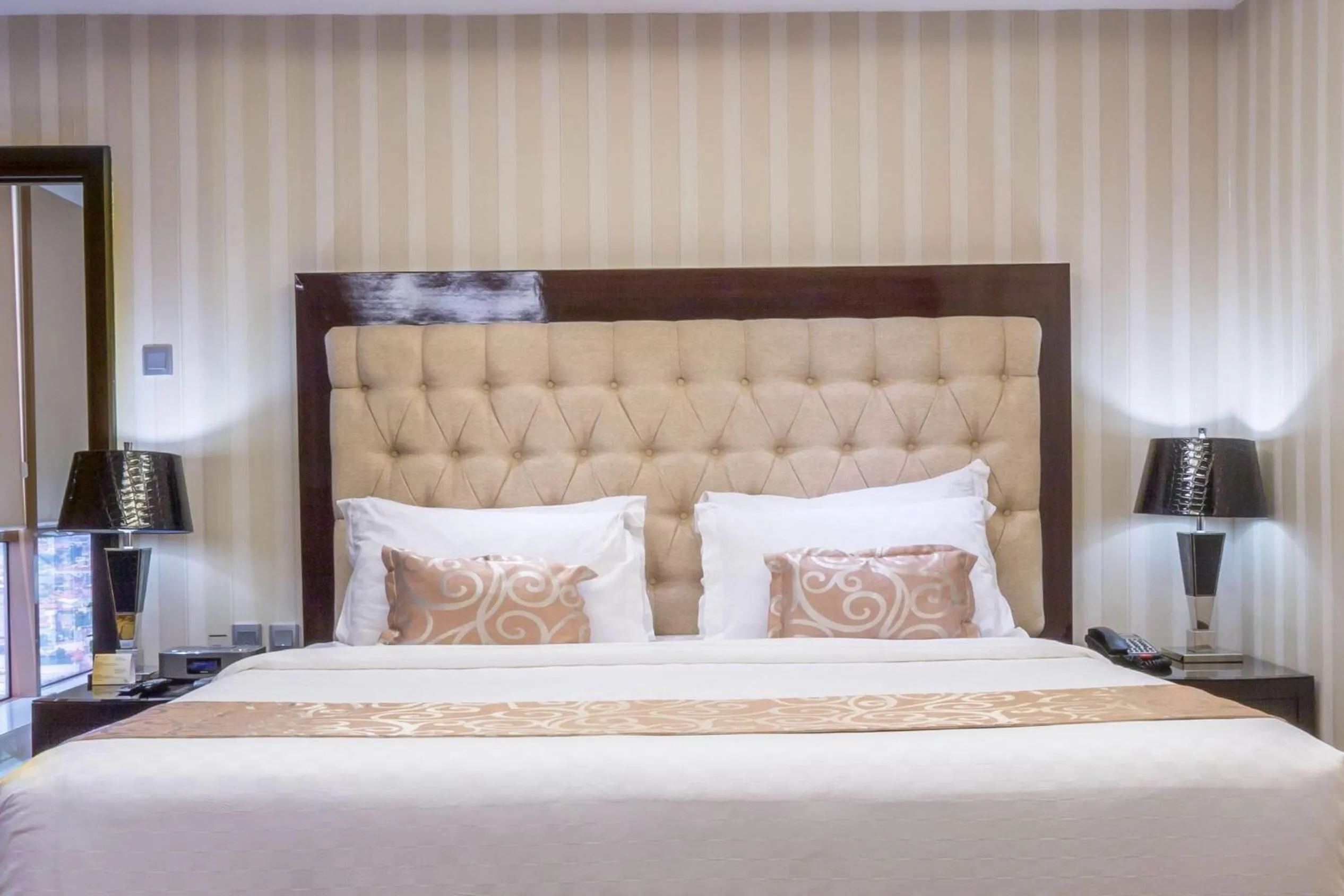 Photo of the whole room, Bed in Wyndham Surabaya