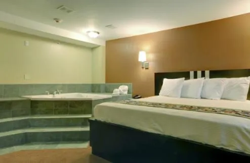 Bed in Americas Best Value Inn Caldwell