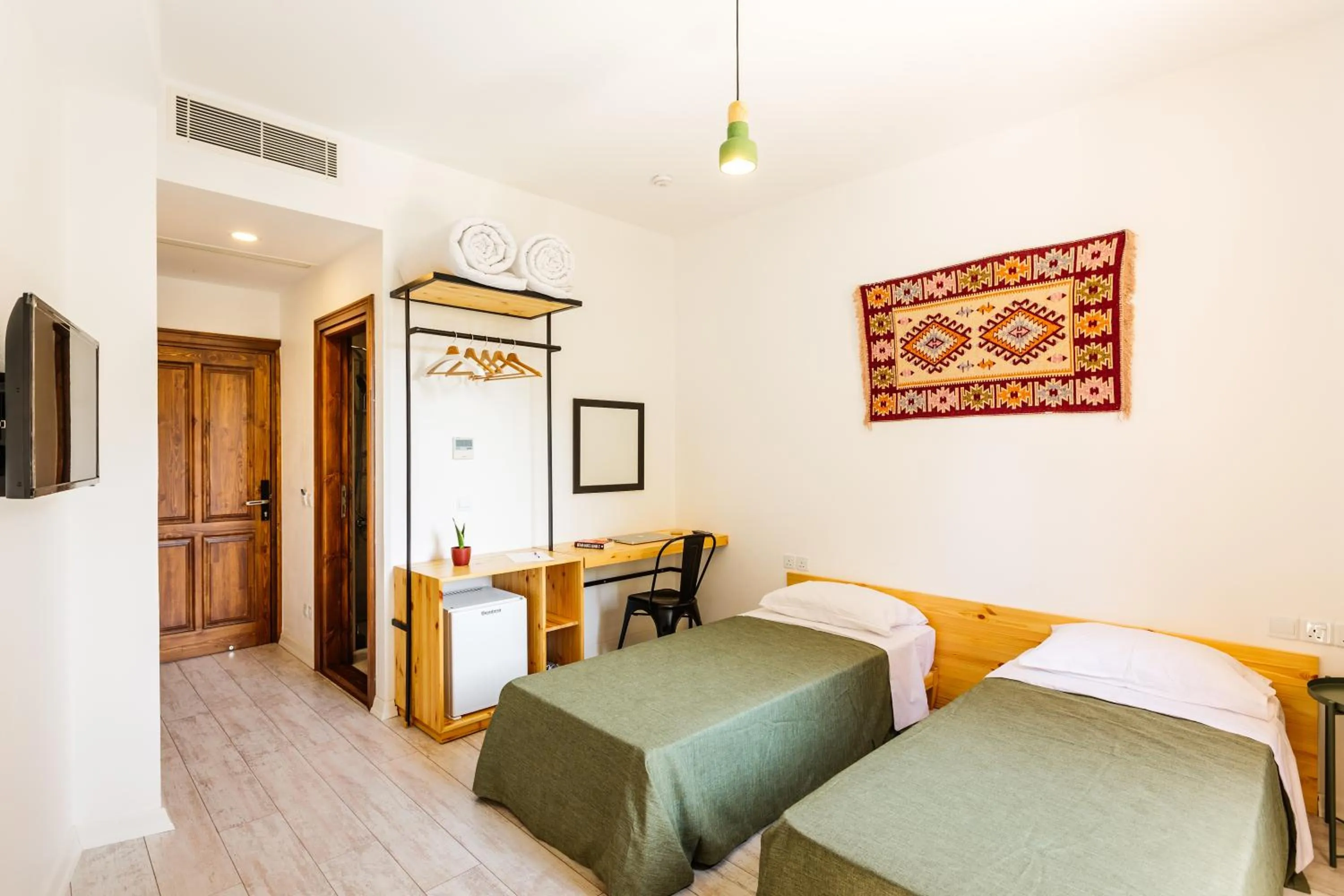 Photo of the whole room, Bed in Djumba Hotel & Cafe