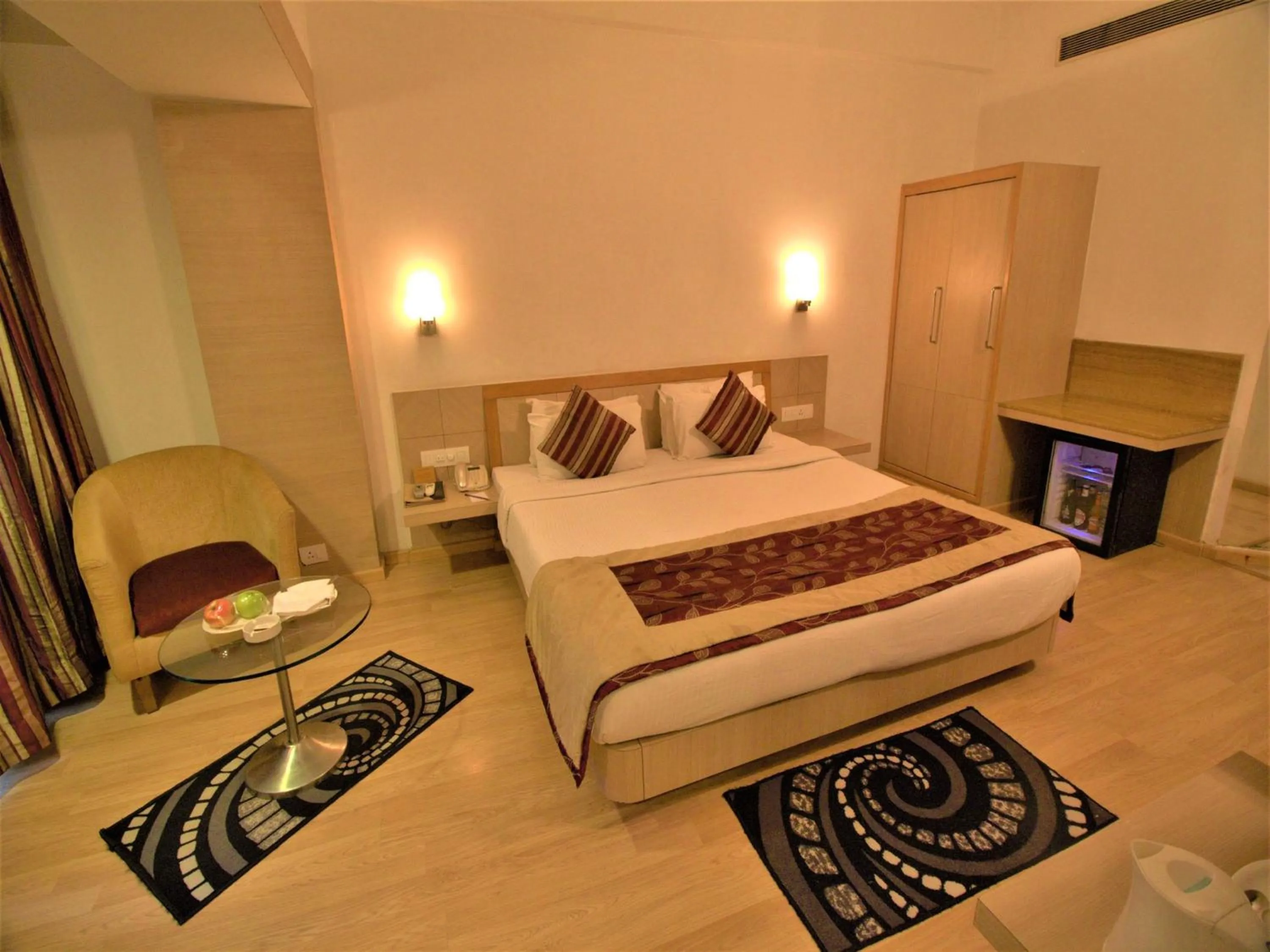 Photo of the whole room, Bed in IRA By Orchid Bhubaneswar