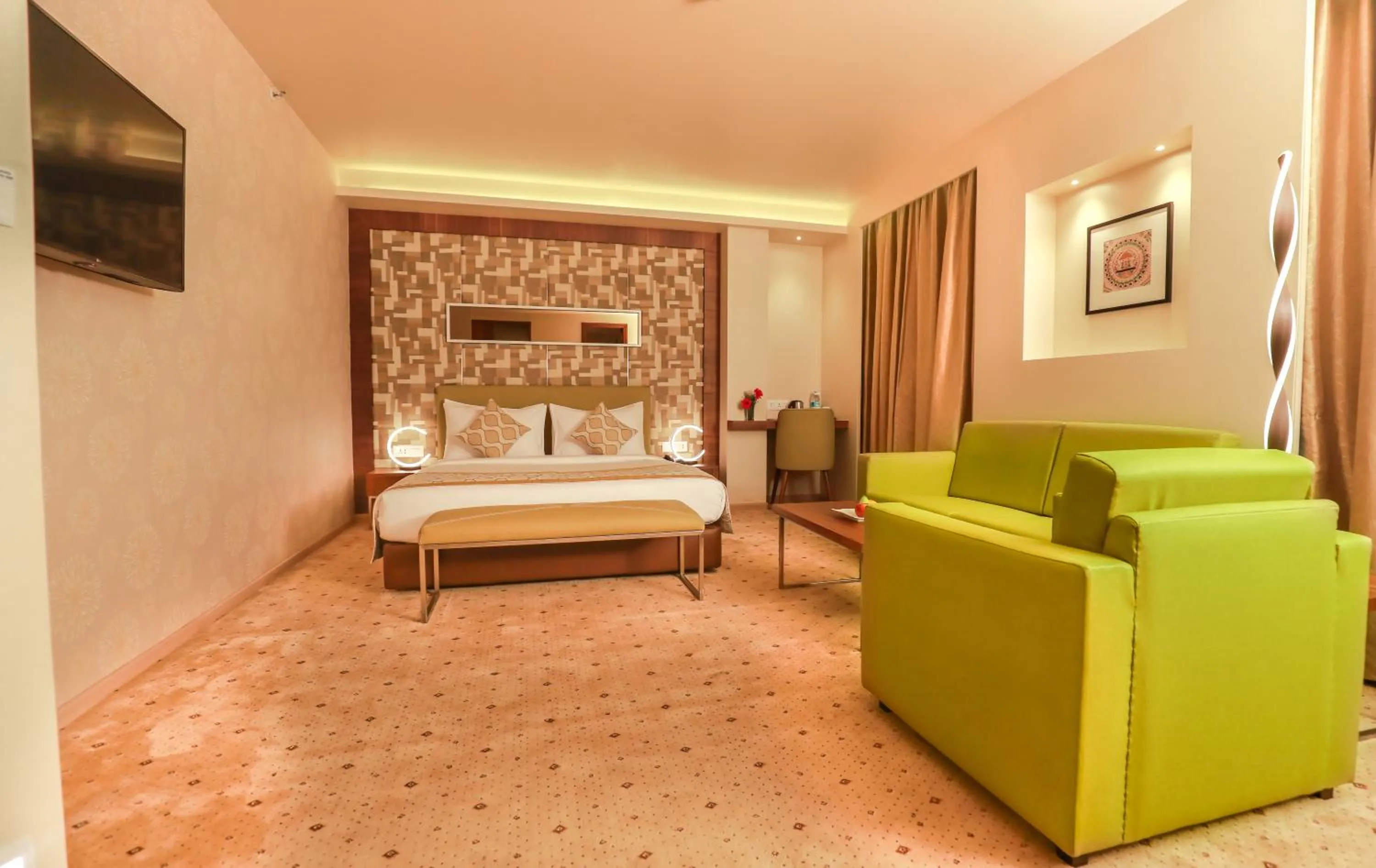 Seating area, Bed in IRA By Orchid Bhubaneswar