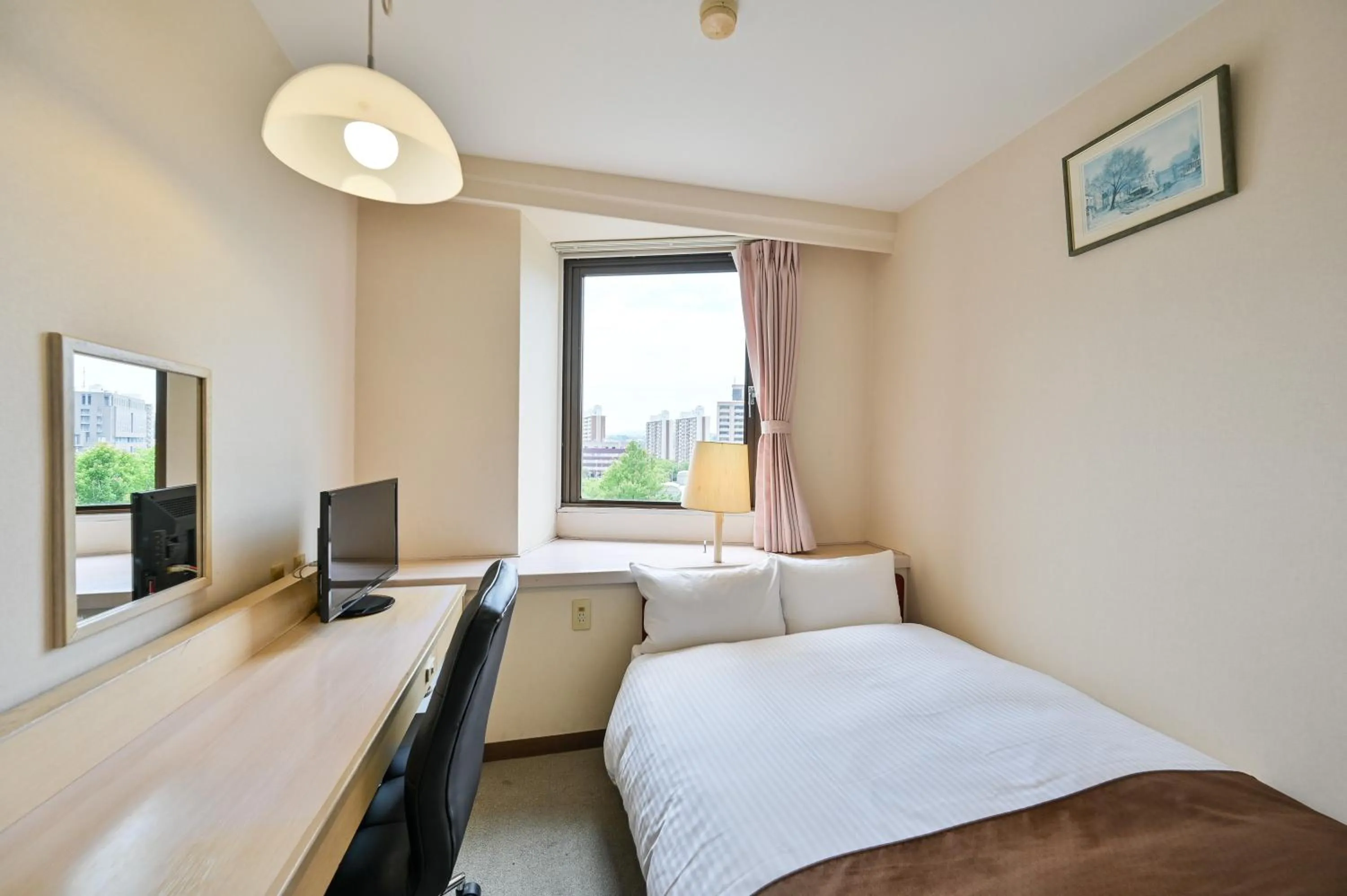 Photo of the whole room, Bed in Kagoshima Daiichi Hotel Kamoike