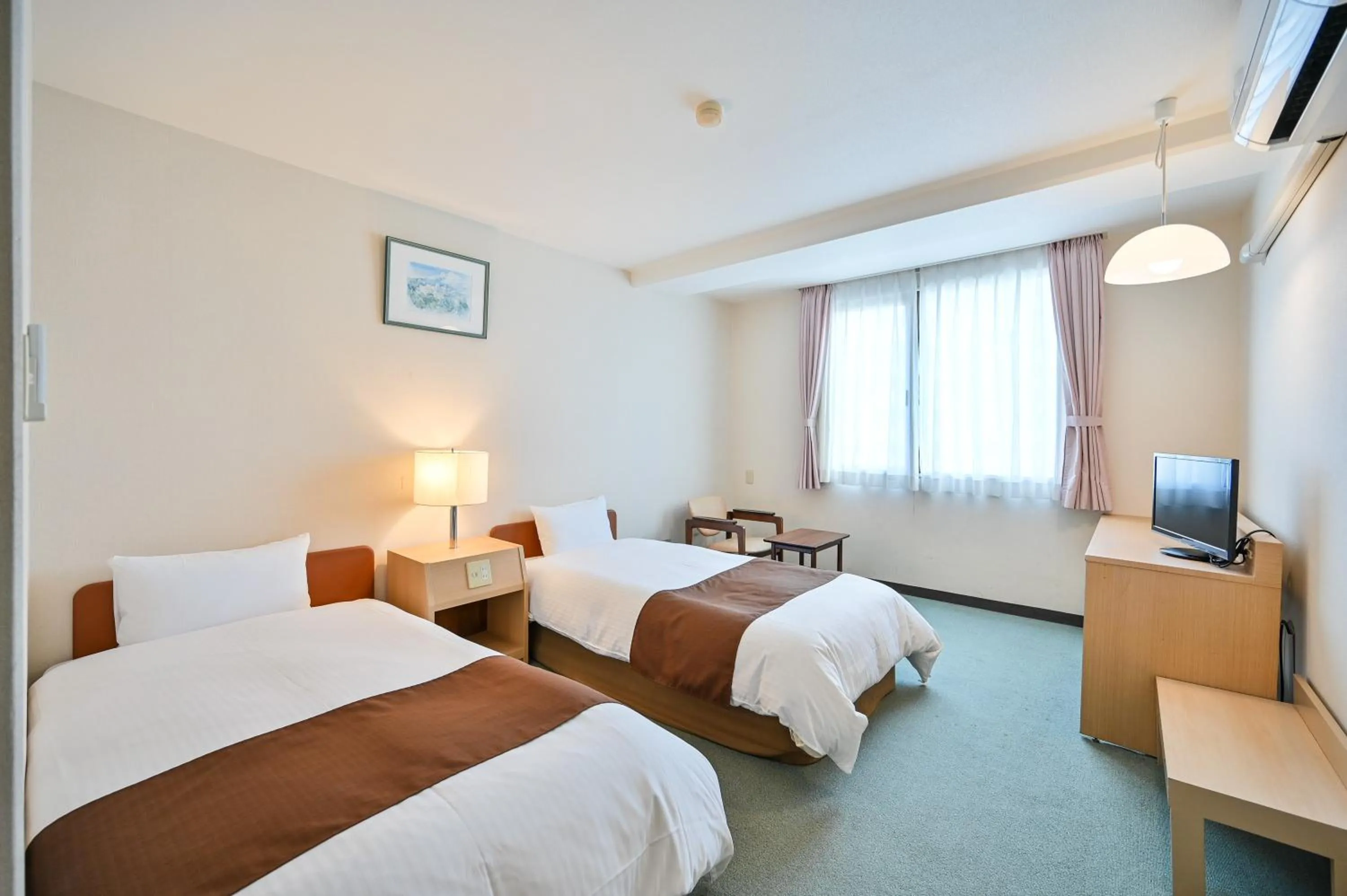 Photo of the whole room, Bed in Kagoshima Daiichi Hotel Kamoike
