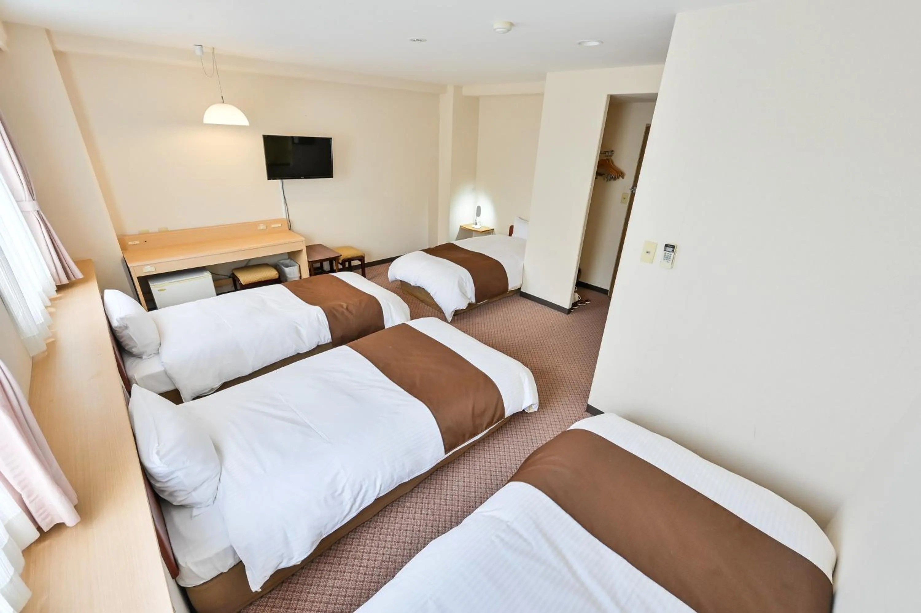 Photo of the whole room, Bed in Kagoshima Daiichi Hotel Kamoike