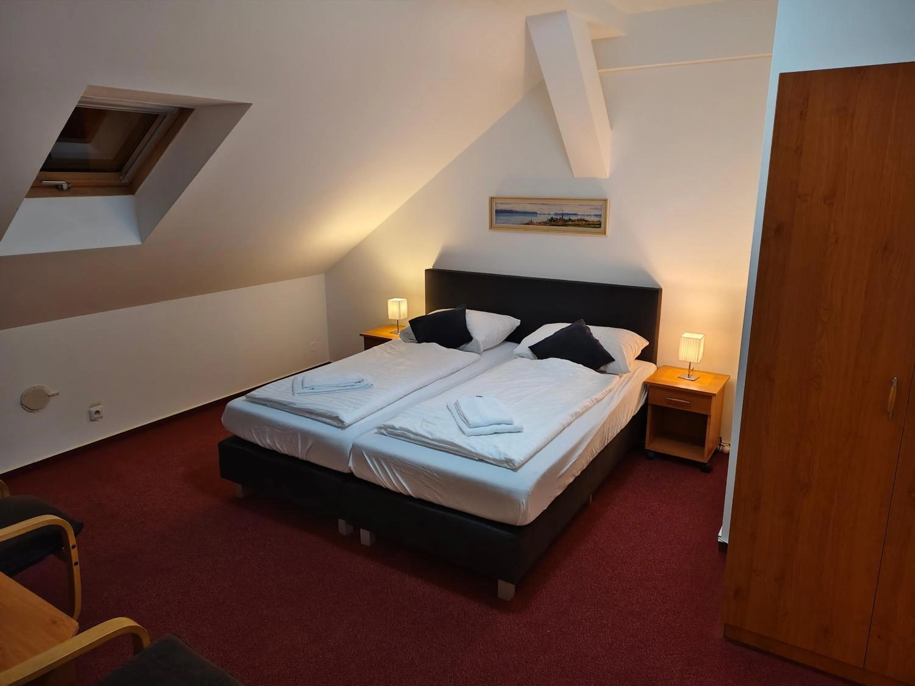 Bed in Hotel Bílý Koníček