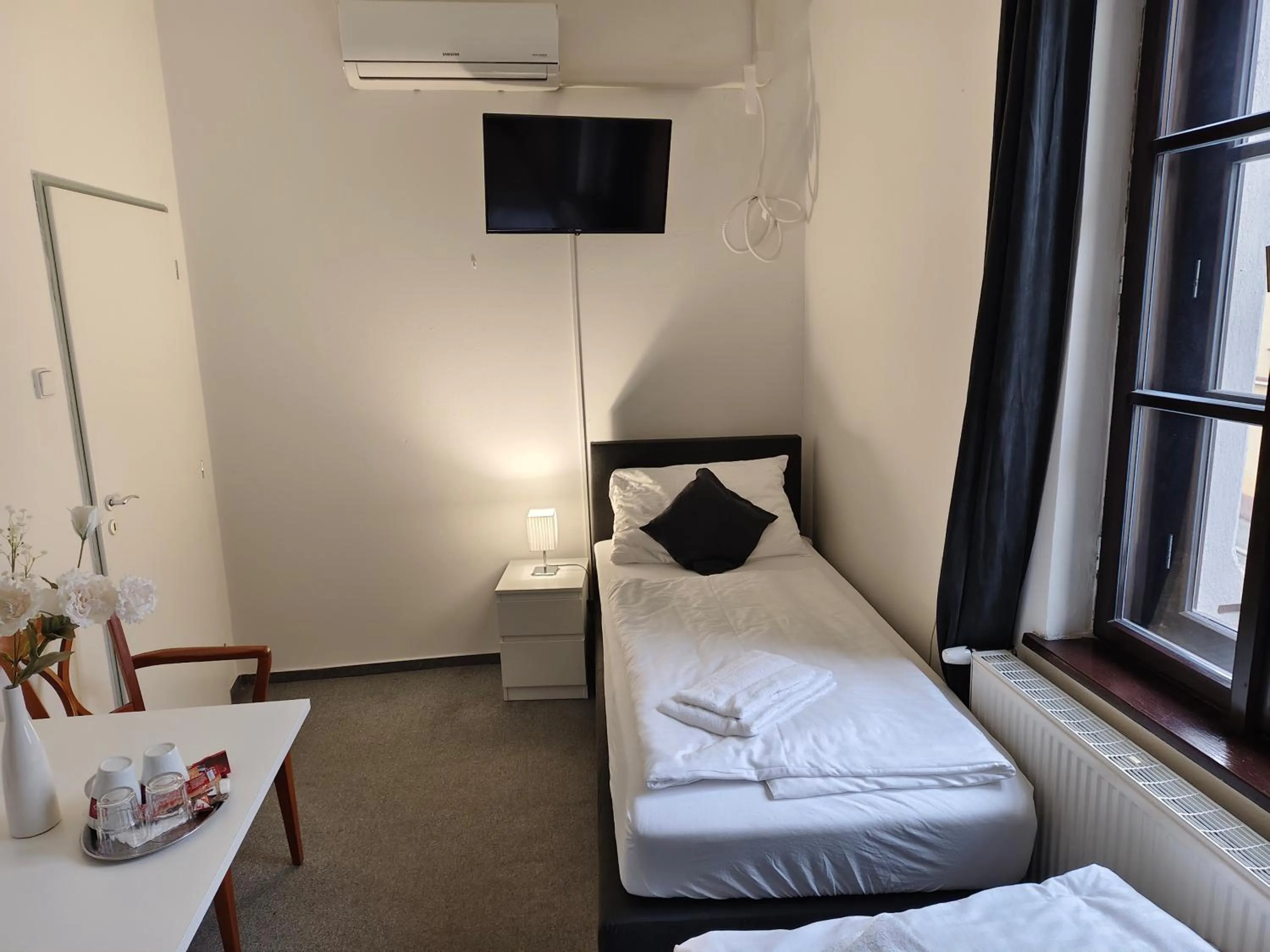 Bed in Hotel Bílý Koníček