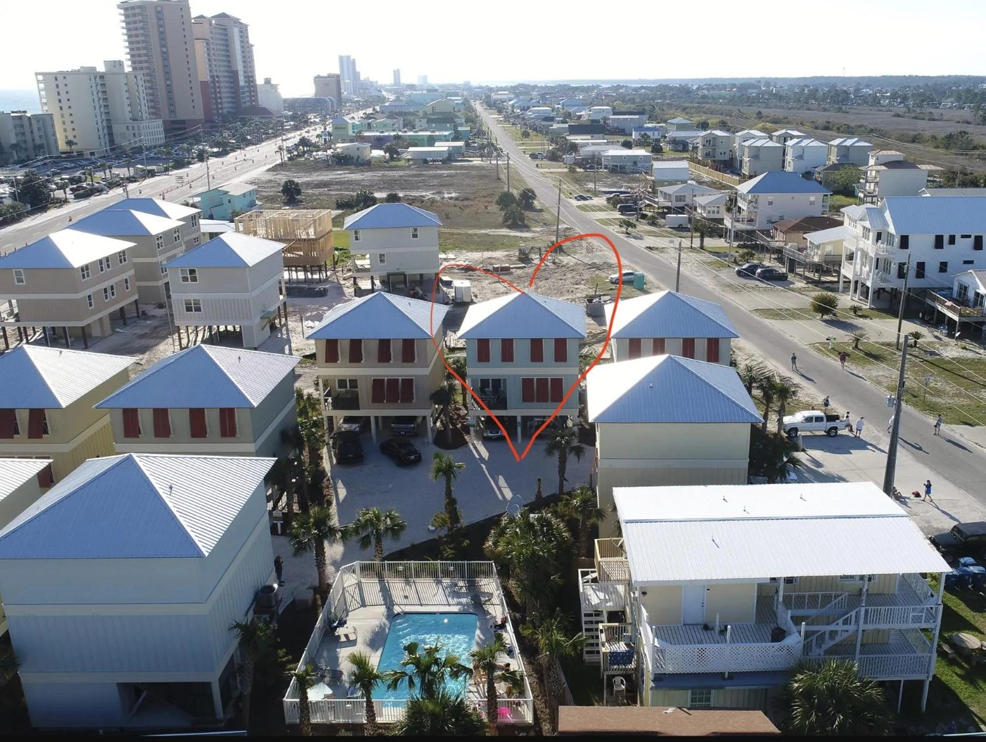 Property building in TRUE BLUE-Coastal cottage-3 min walk to beach! POOL!