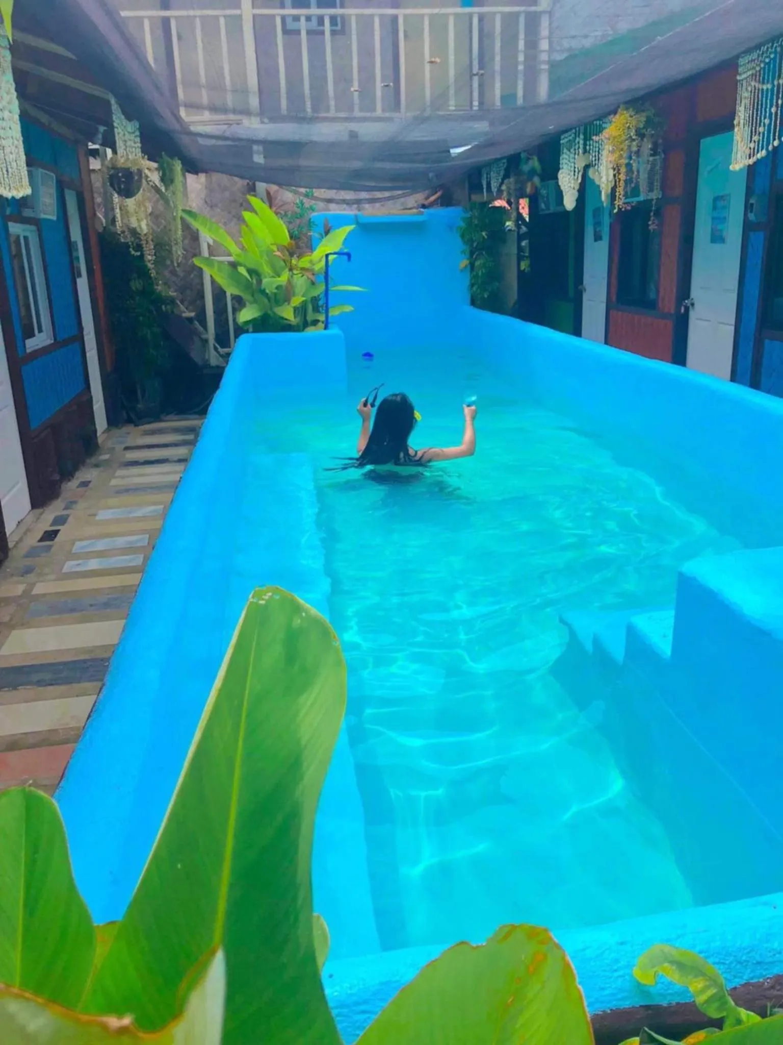 Swimming pool in Mama Hostel & Guest House