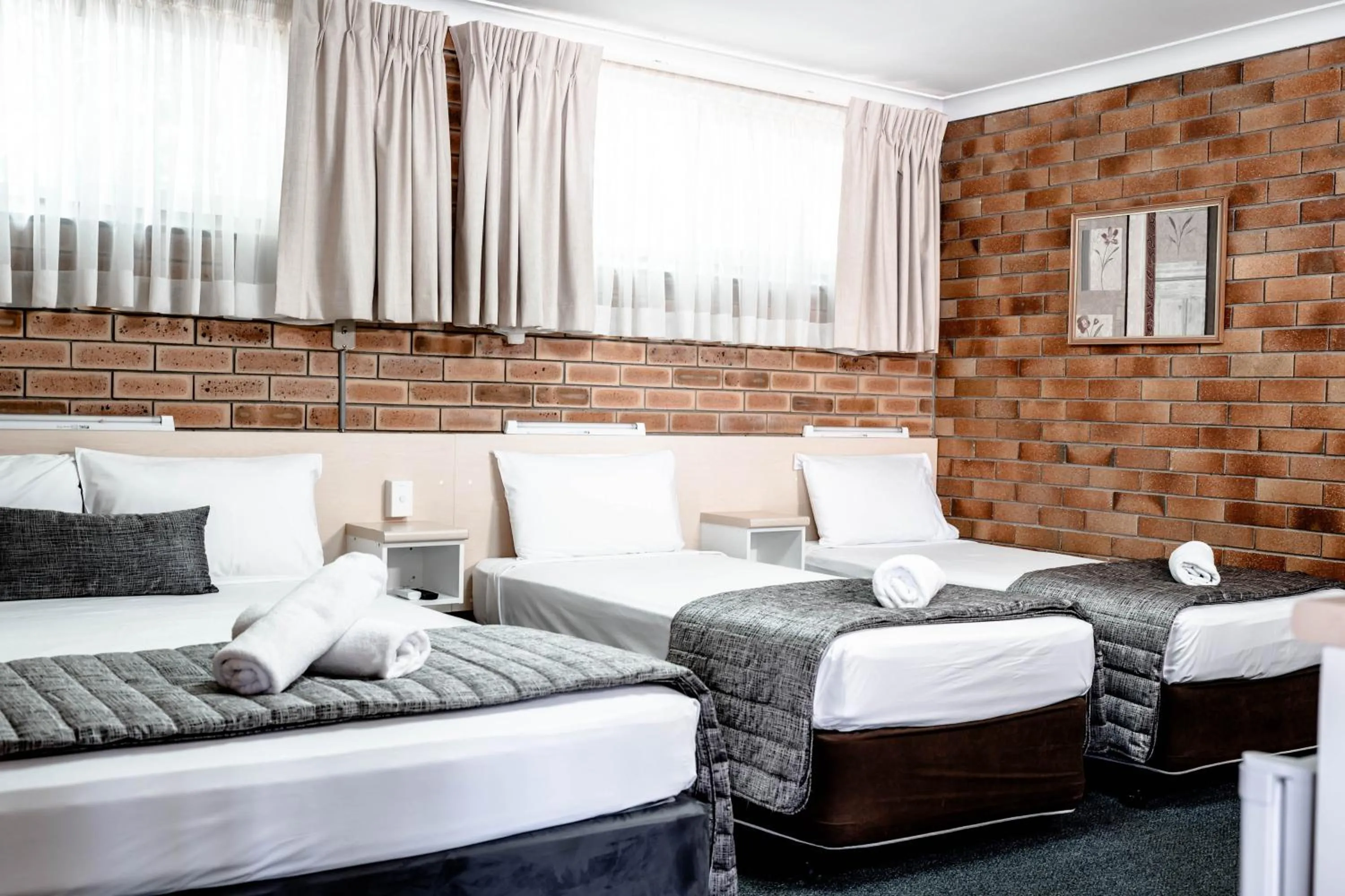 Bed in Buckaroo Motor Inn