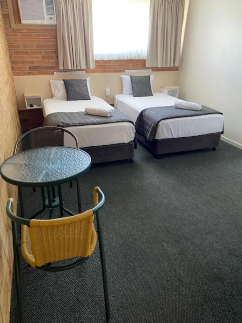 Bed in Buckaroo Motor Inn