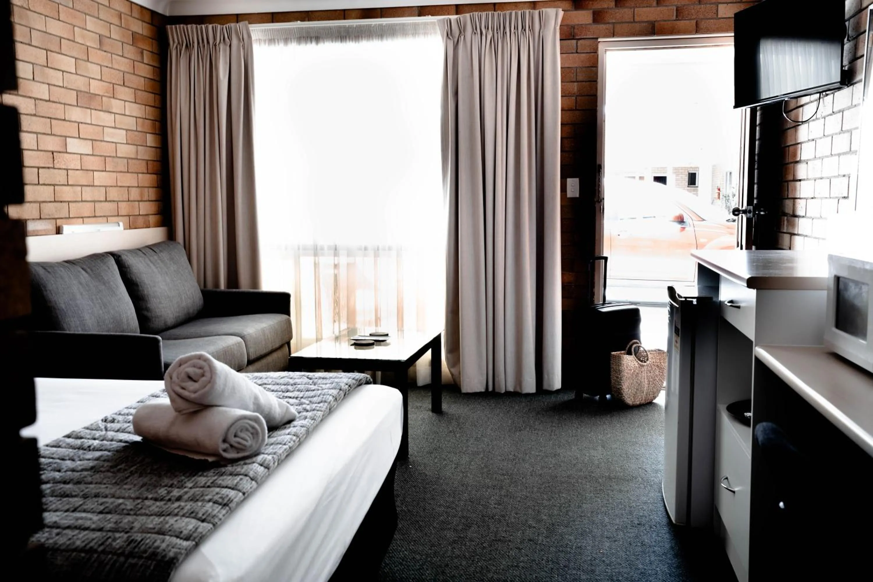 Bed in Buckaroo Motor Inn