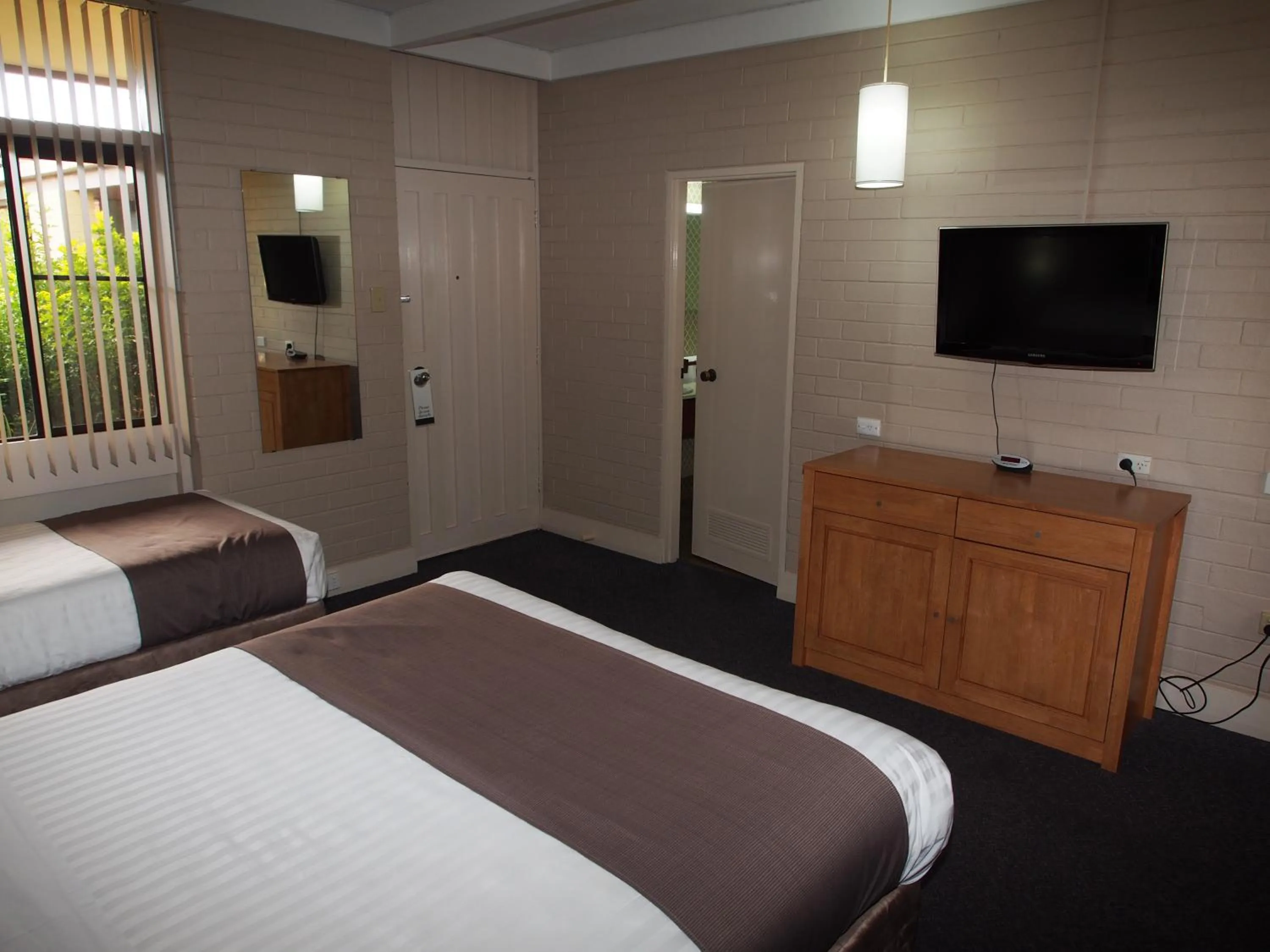 Photo of the whole room, Bed in Dongara Hotel Motel