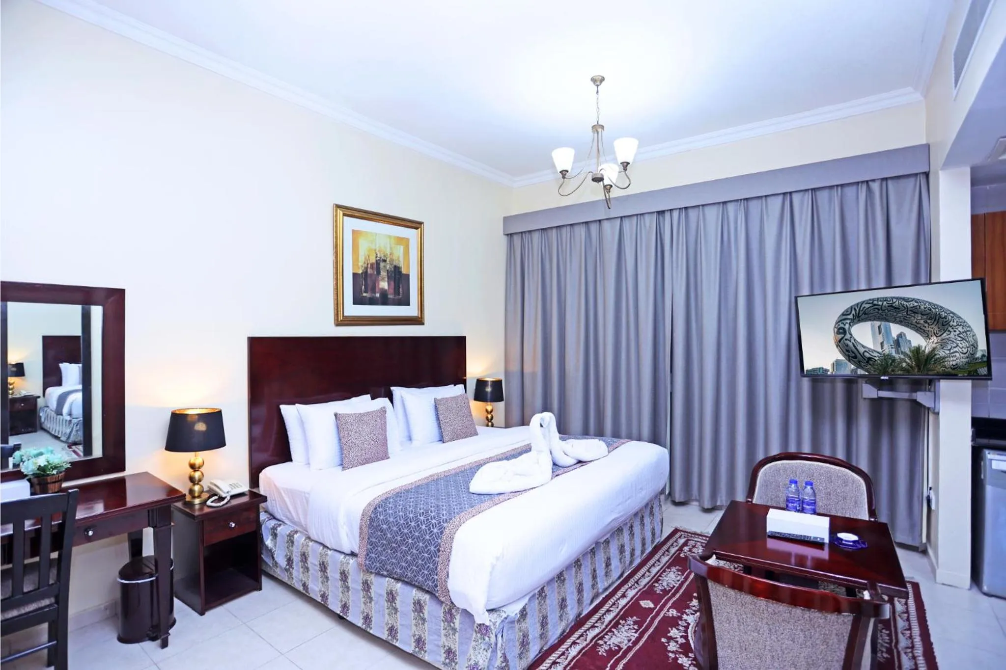 Bed in Icon Hotel Apartments