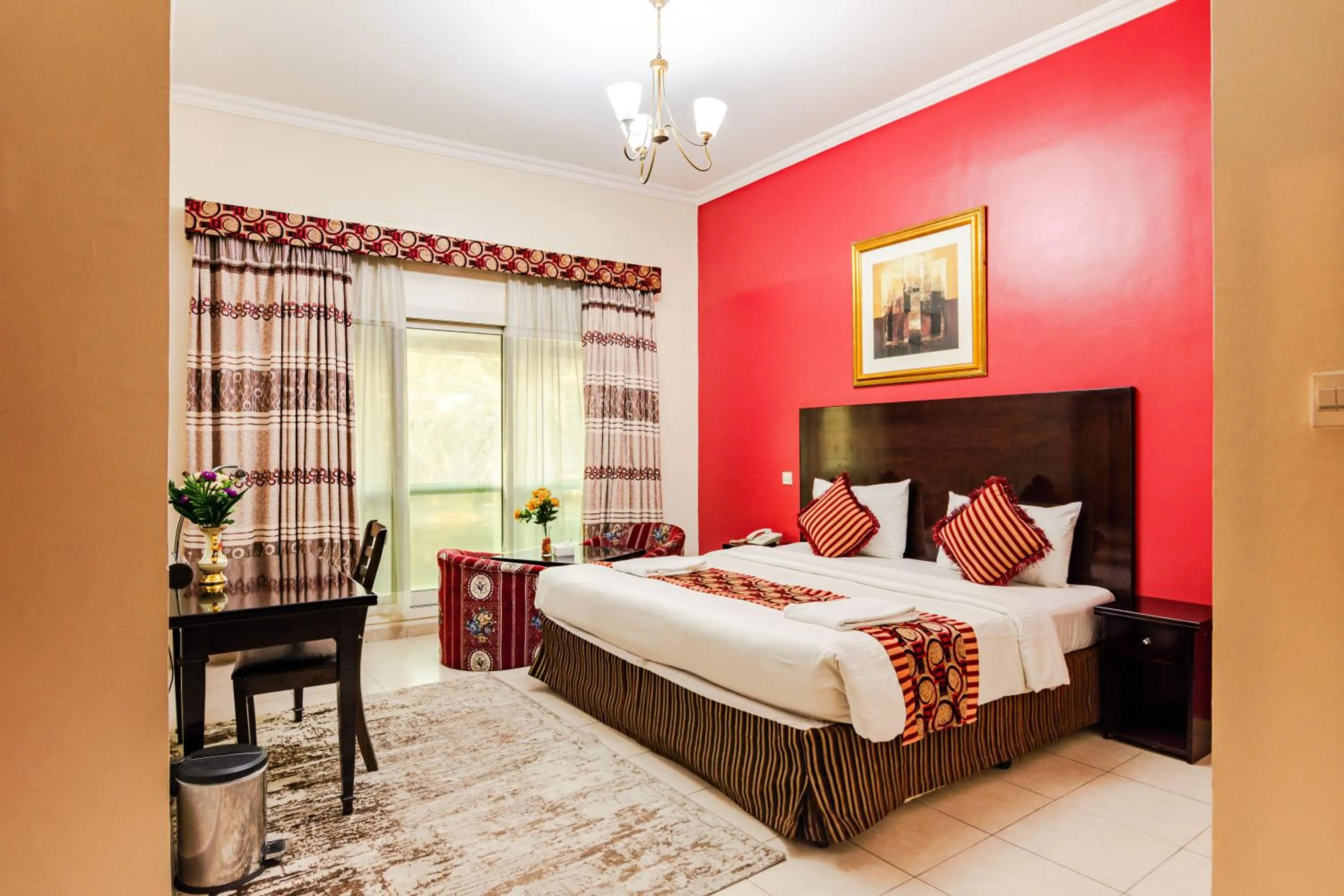 Bed in Icon Hotel Apartments