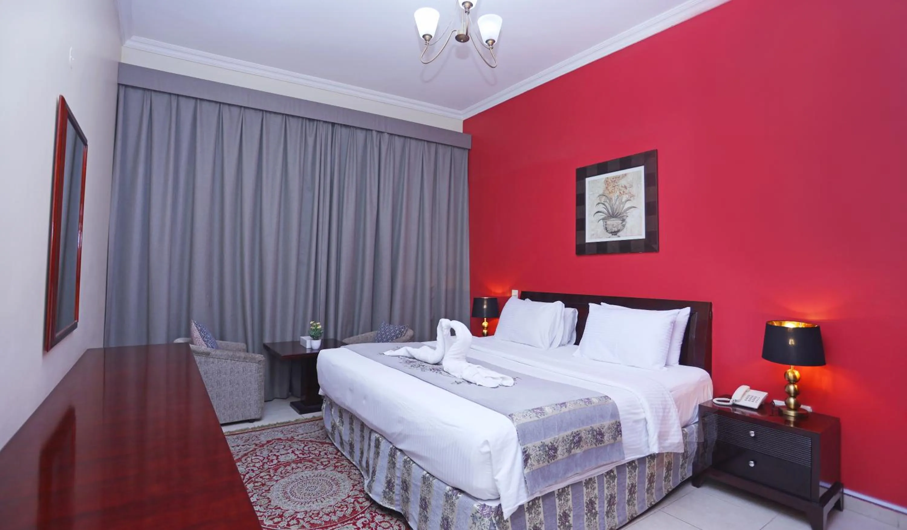 Bed in Icon Hotel Apartments