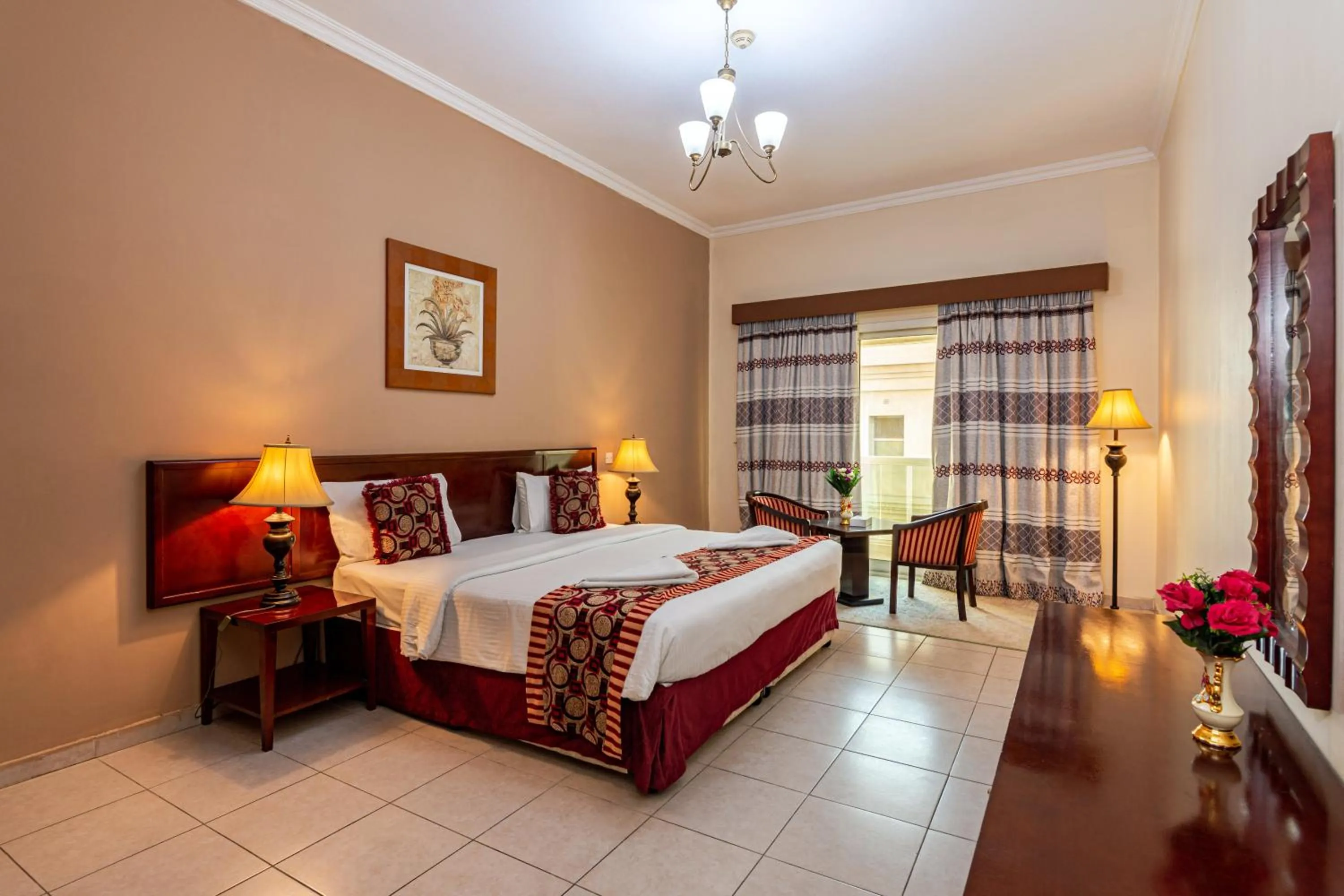 Bed in Icon Hotel Apartments