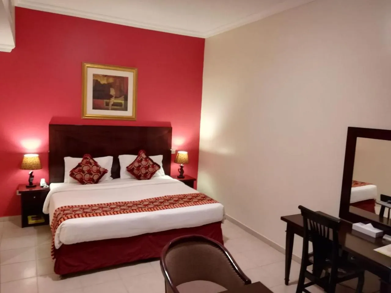 Bed in Icon Hotel Apartments