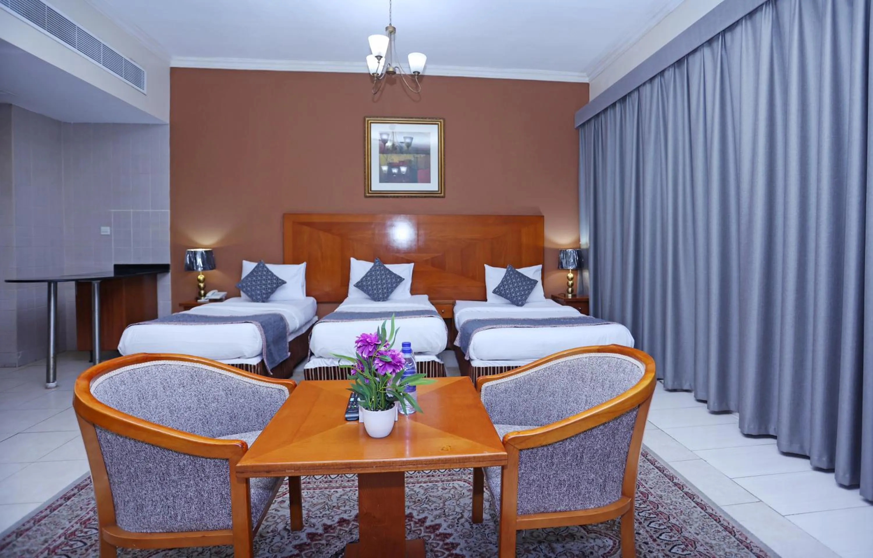 Bed in Icon Hotel Apartments