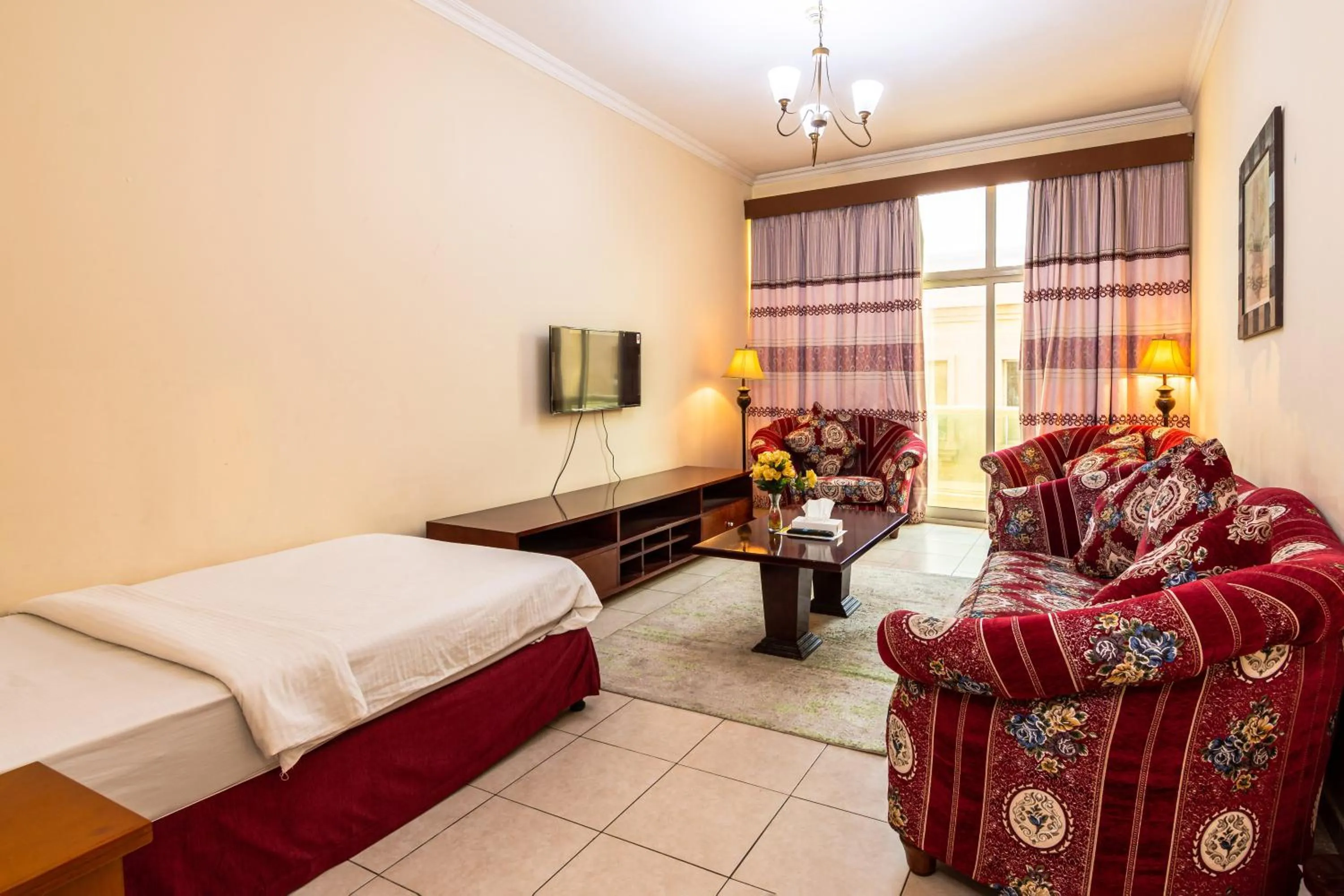 Bed in Icon Hotel Apartments