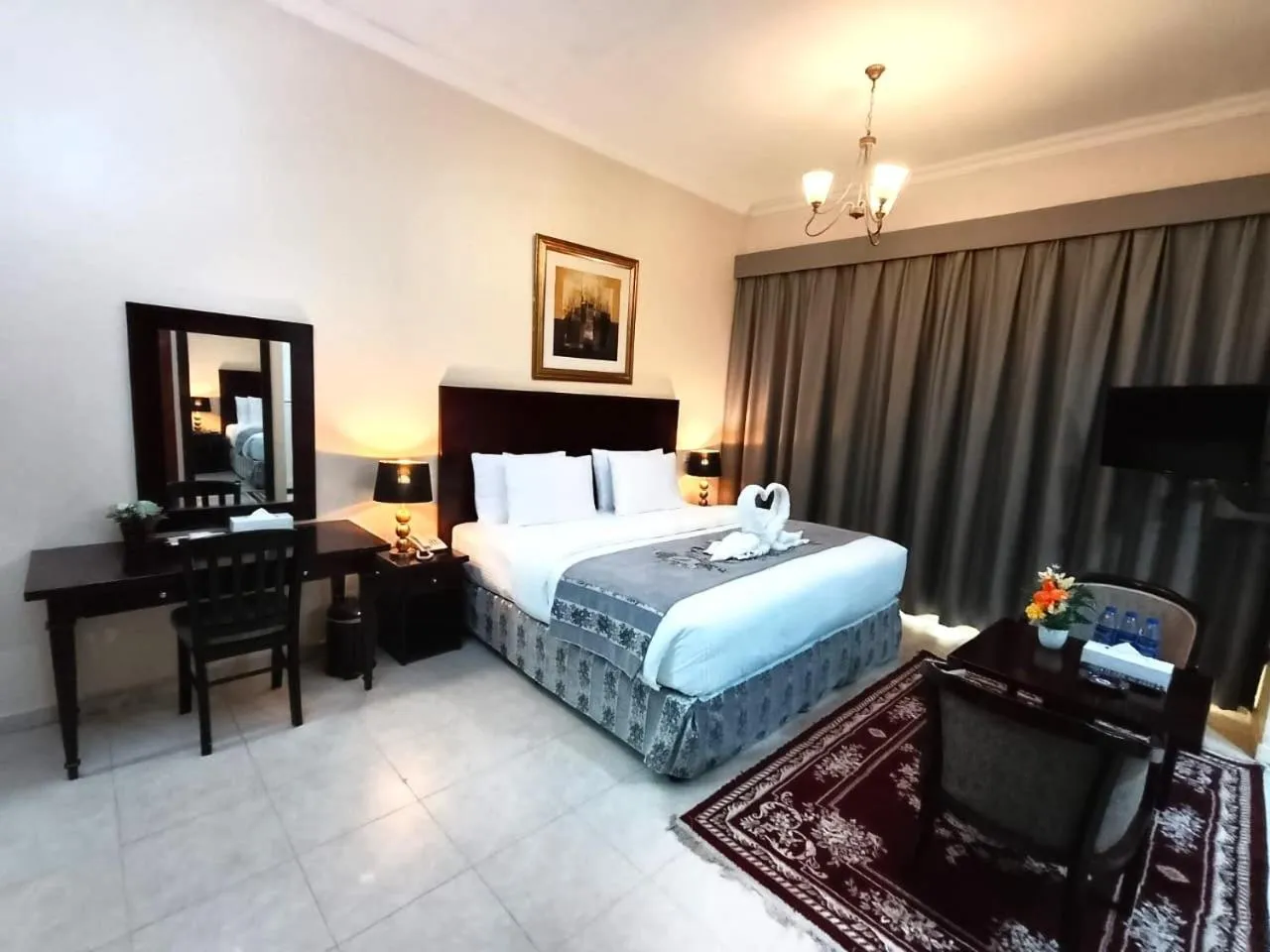 Bed in Icon Hotel Apartments