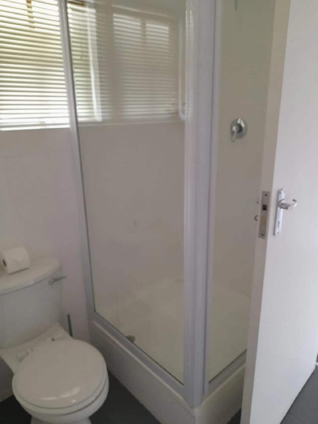 Shower in On The Estuary