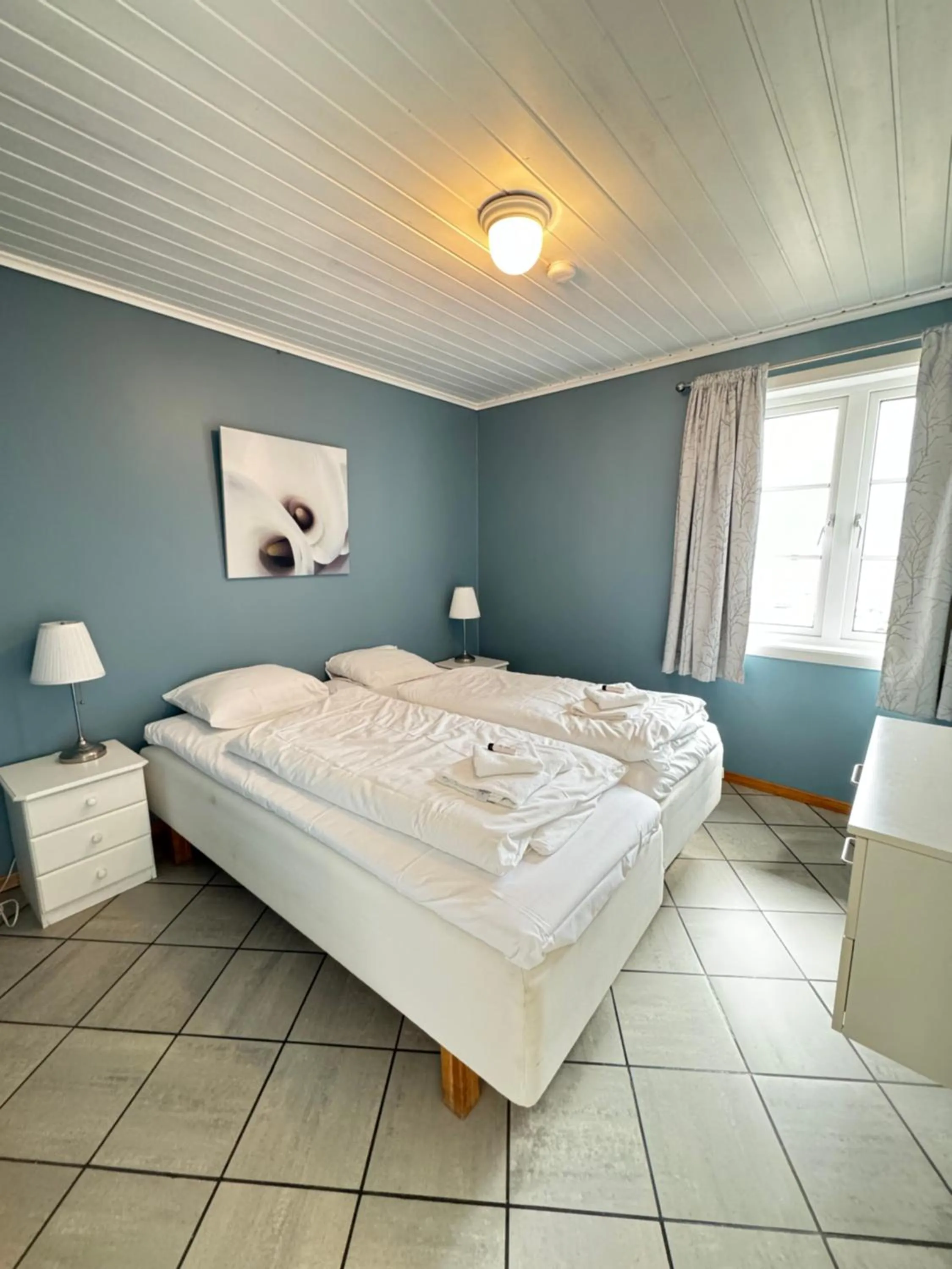 Bed in Sjøberg Hotell og Ferie Leiligheter