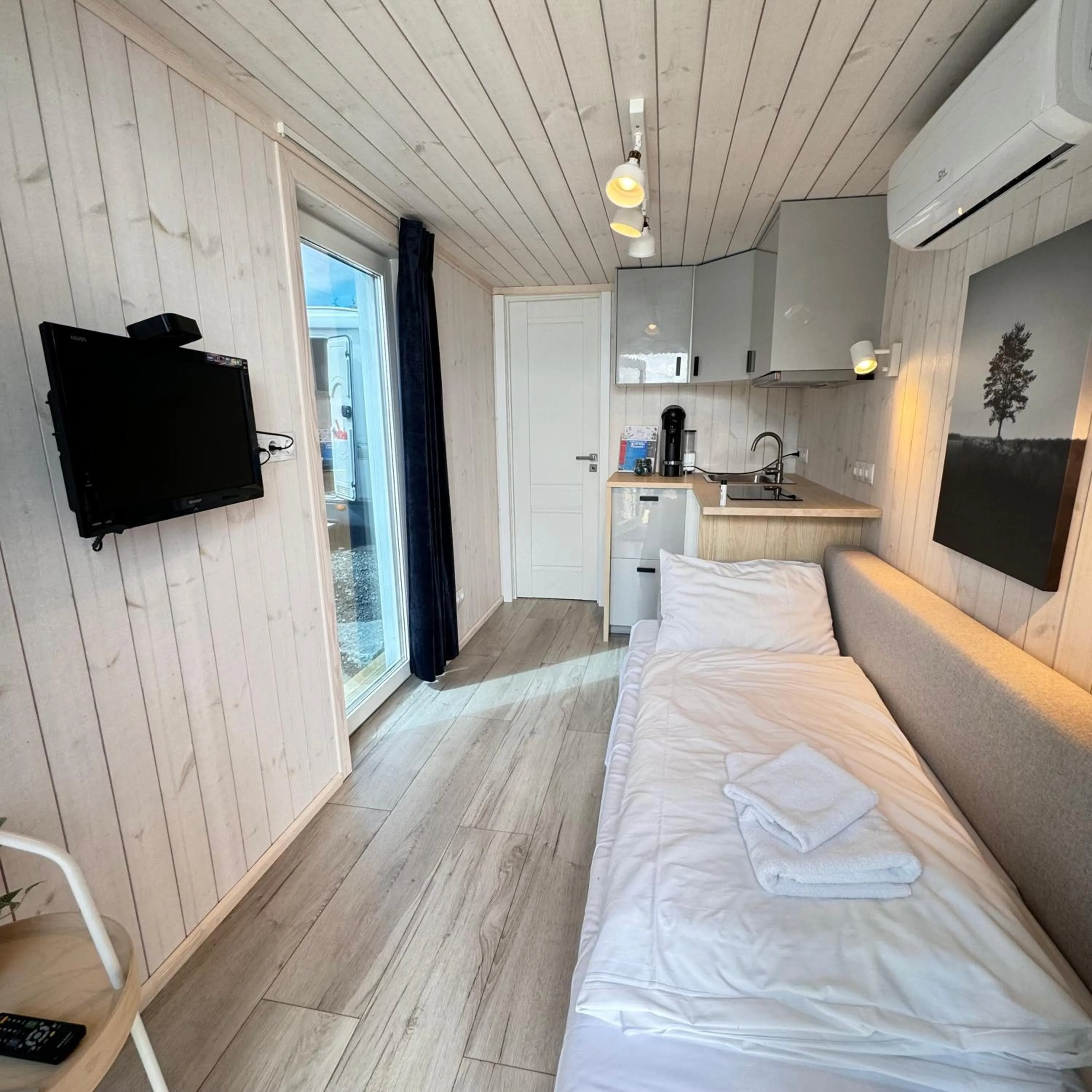 Communal lounge/ TV room in Sjøberg Hotell og Ferie Leiligheter