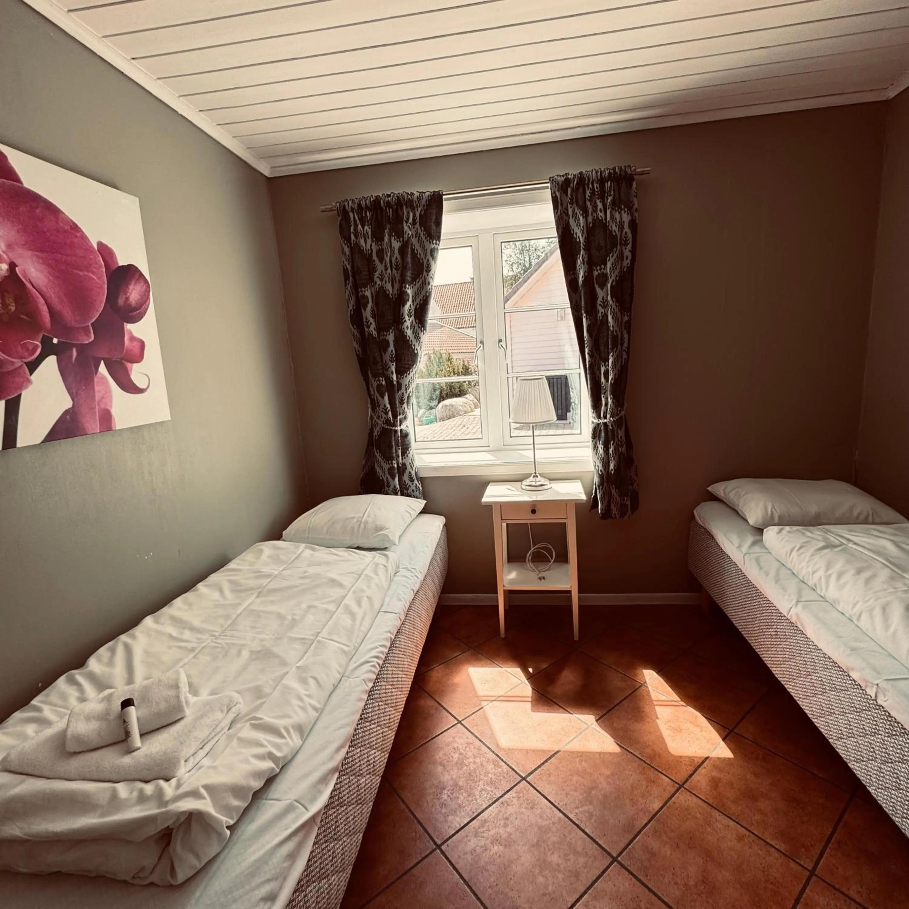 Bed in Sjøberg Hotell og Ferie Leiligheter