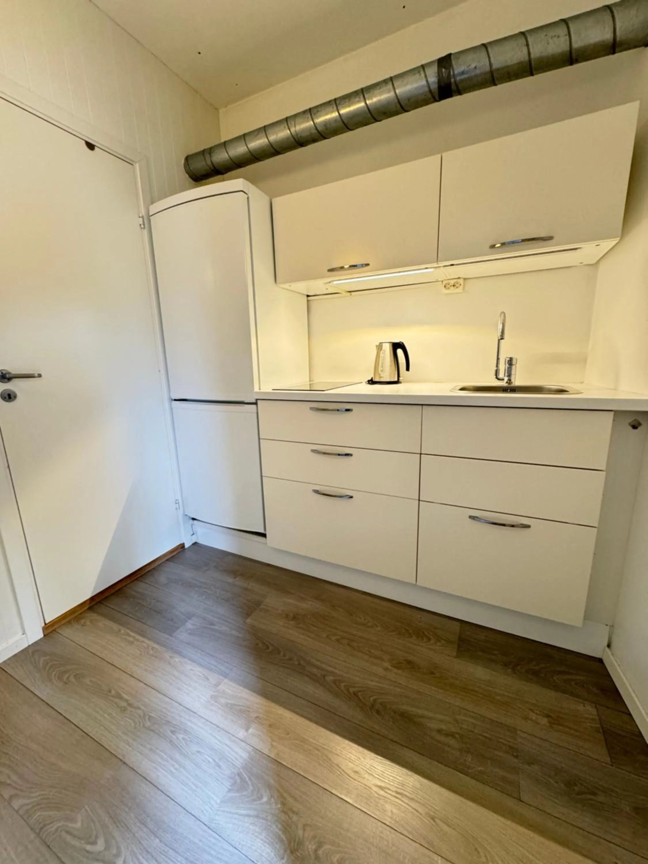 Kitchen or kitchenette in Sjøberg Hotell og Ferie Leiligheter