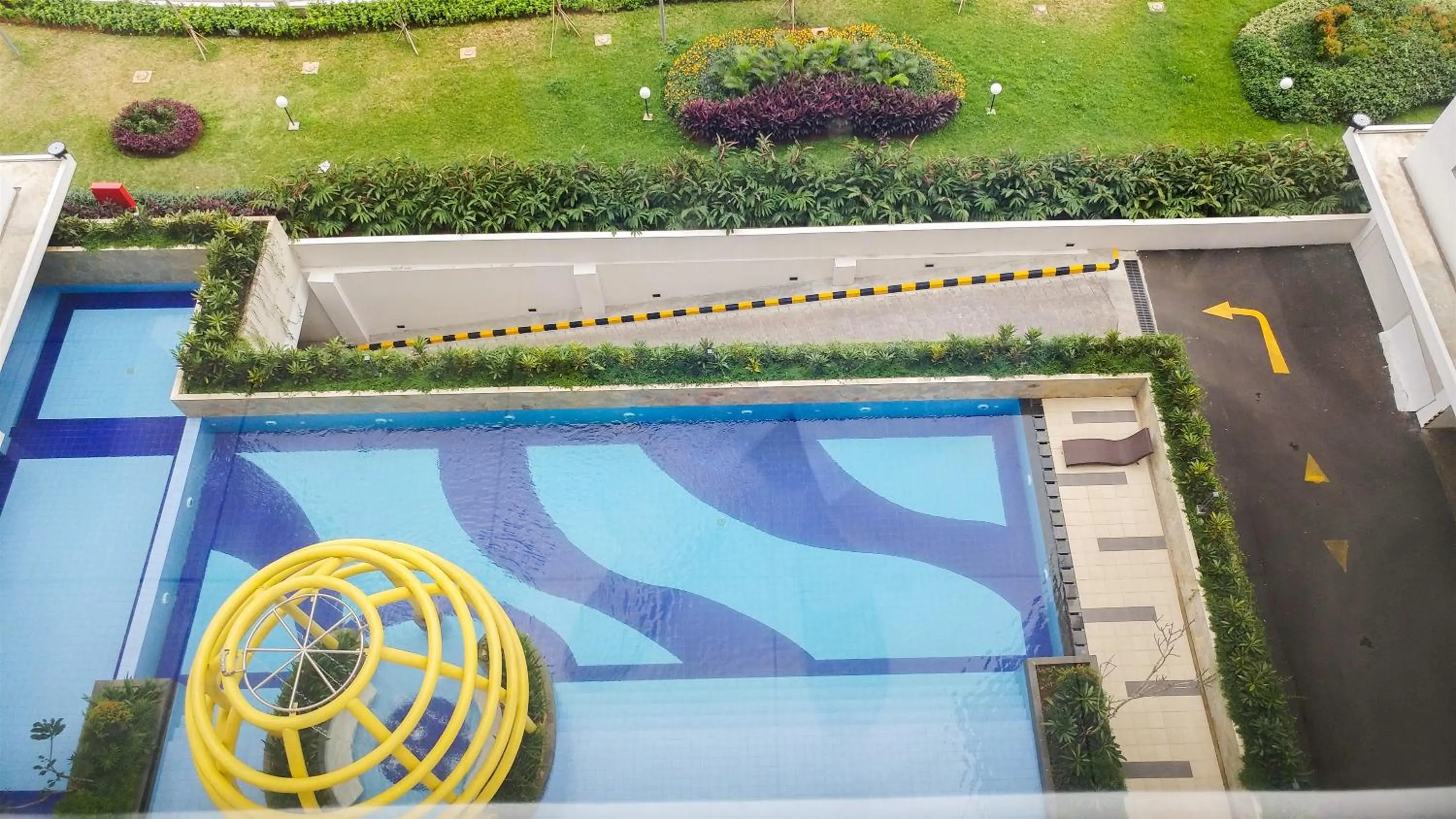 Swimming pool in Simple Studio Bassura City Apartment By Travelio