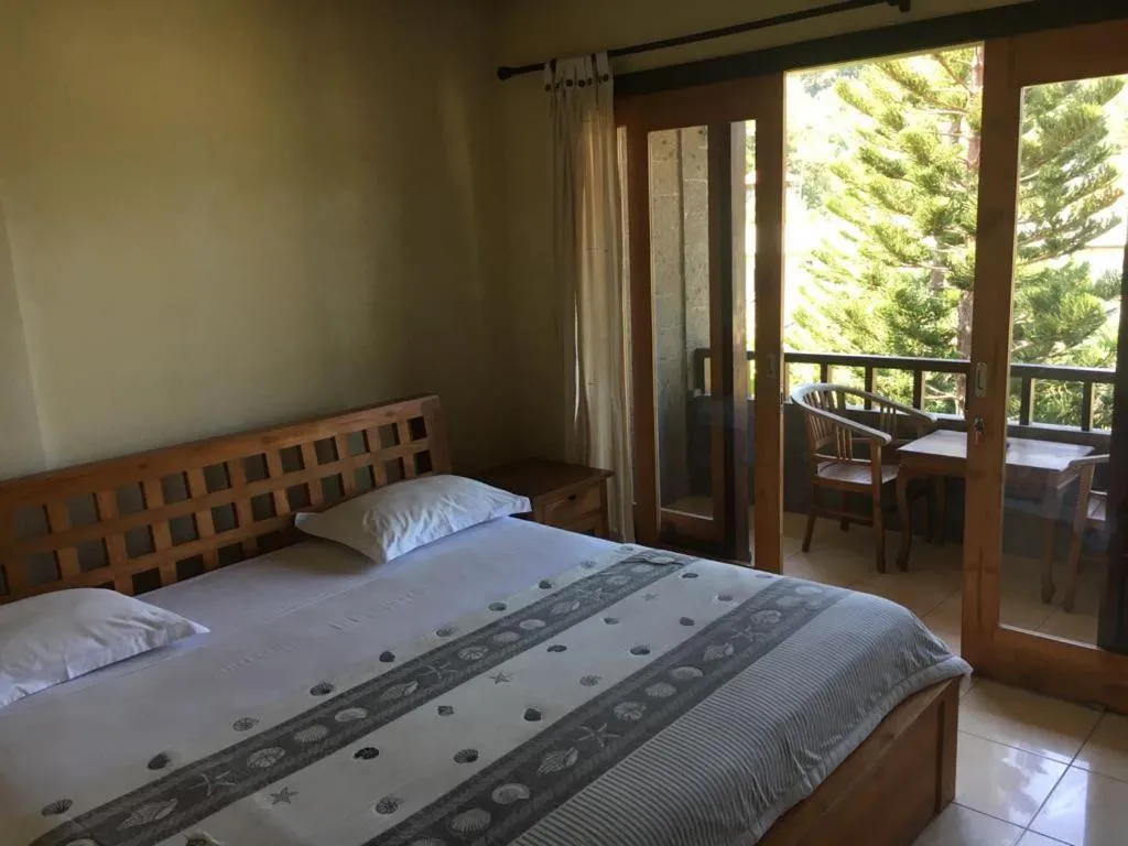 Bed in Padangbai Beach inn