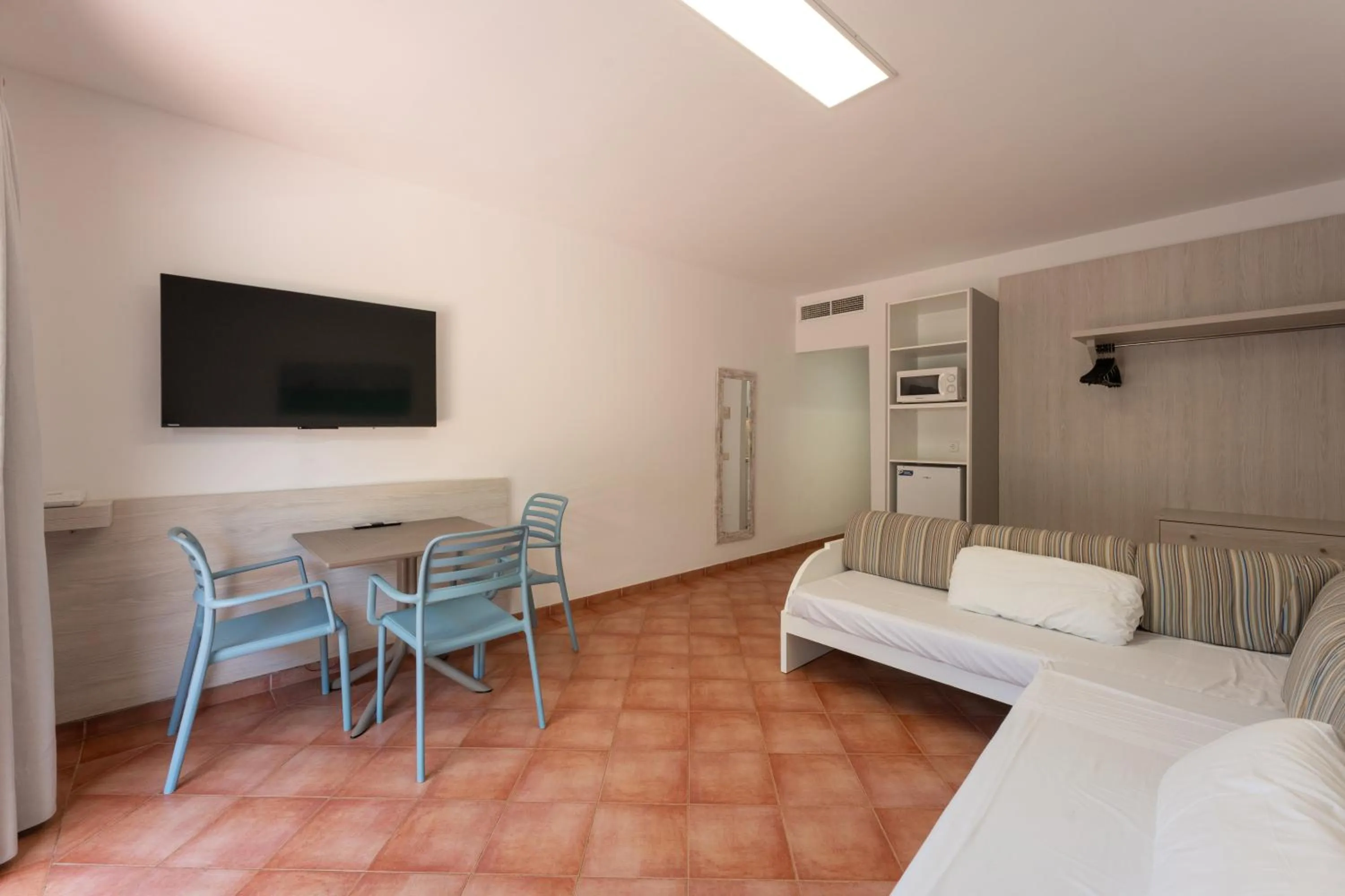 Living room in Hotel Club Es Talaial