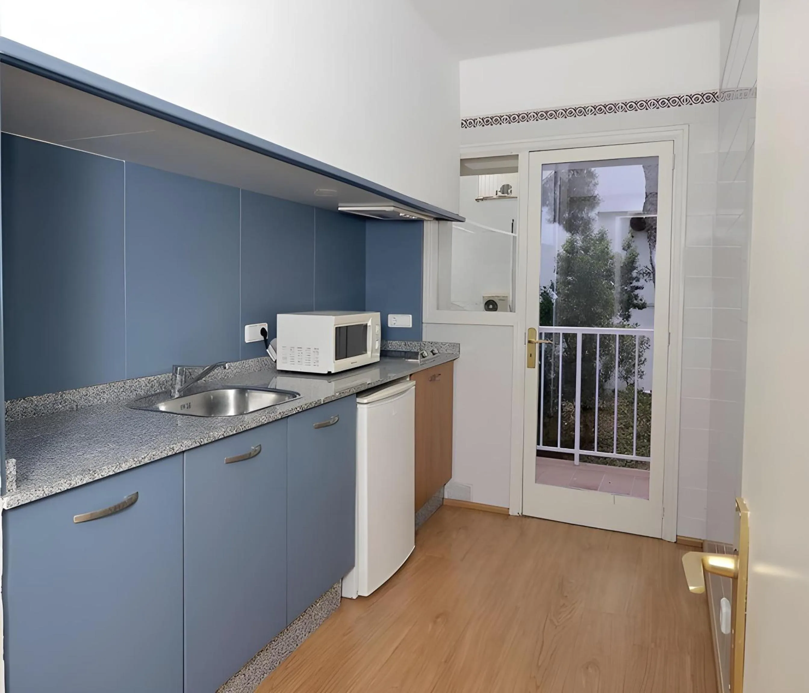 kitchen in Hotel Club Es Talaial