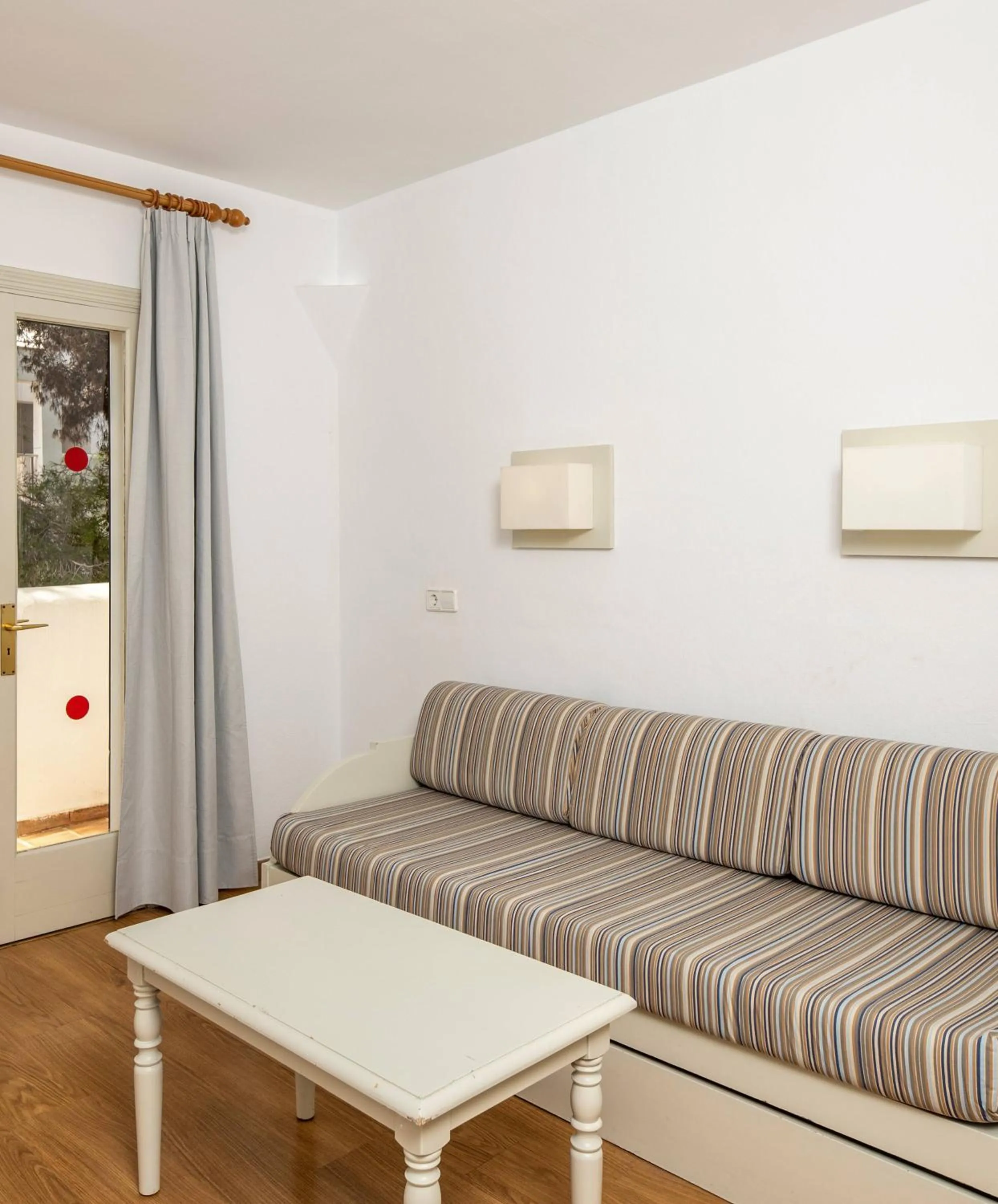 Living room in Hotel Club Es Talaial