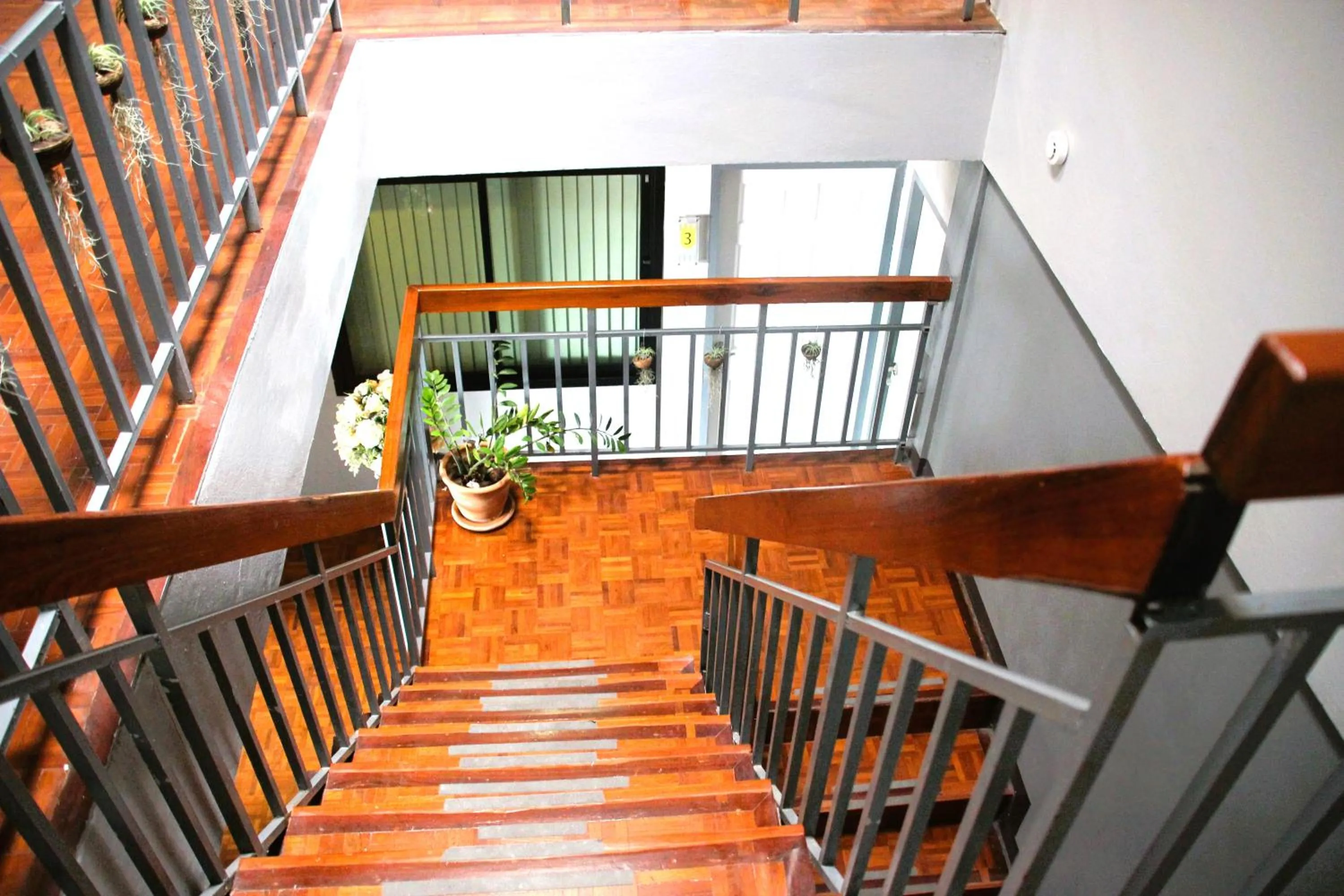 Property building in Lux Rooms Night Bazaar