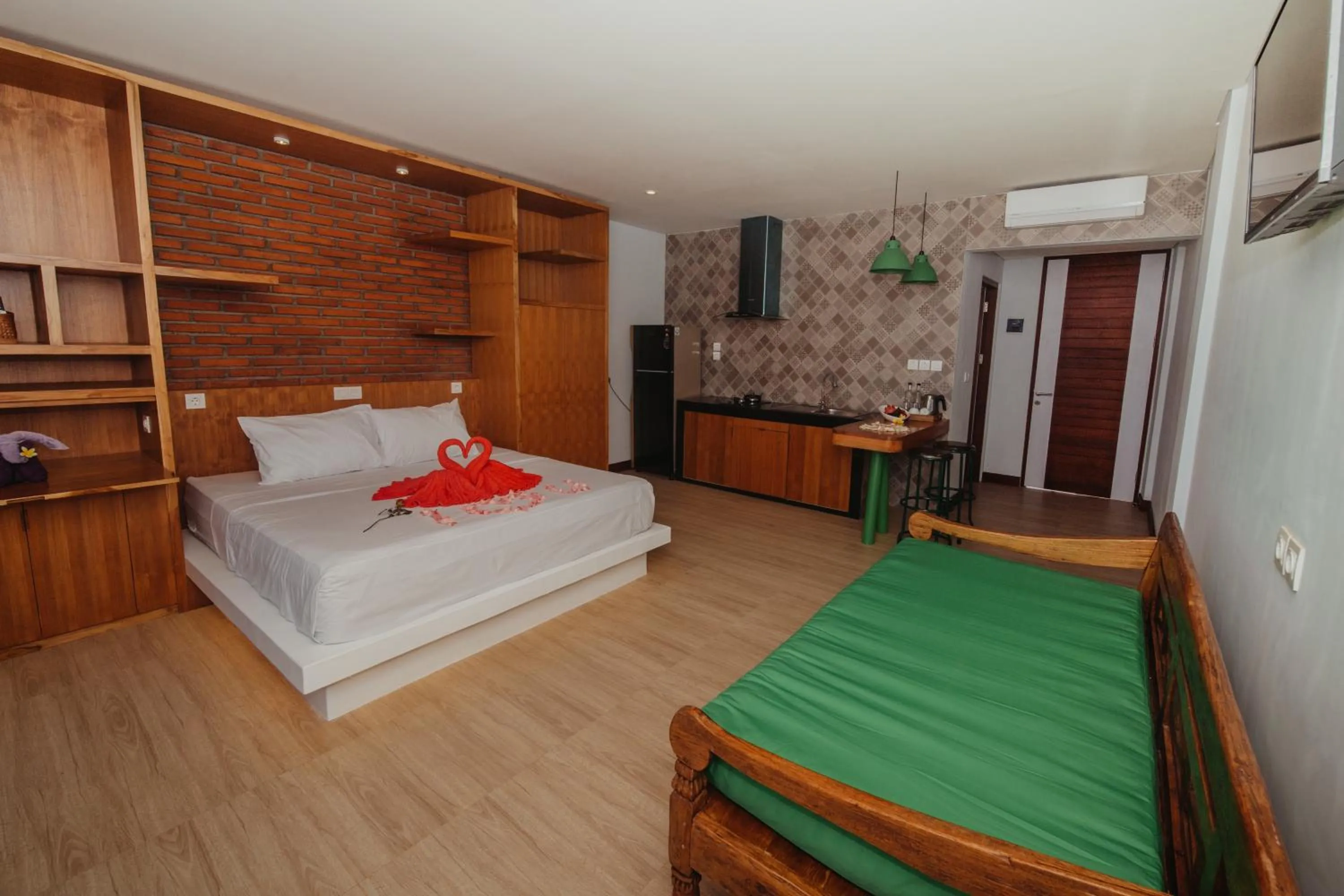 Bed in Kaen Apartments