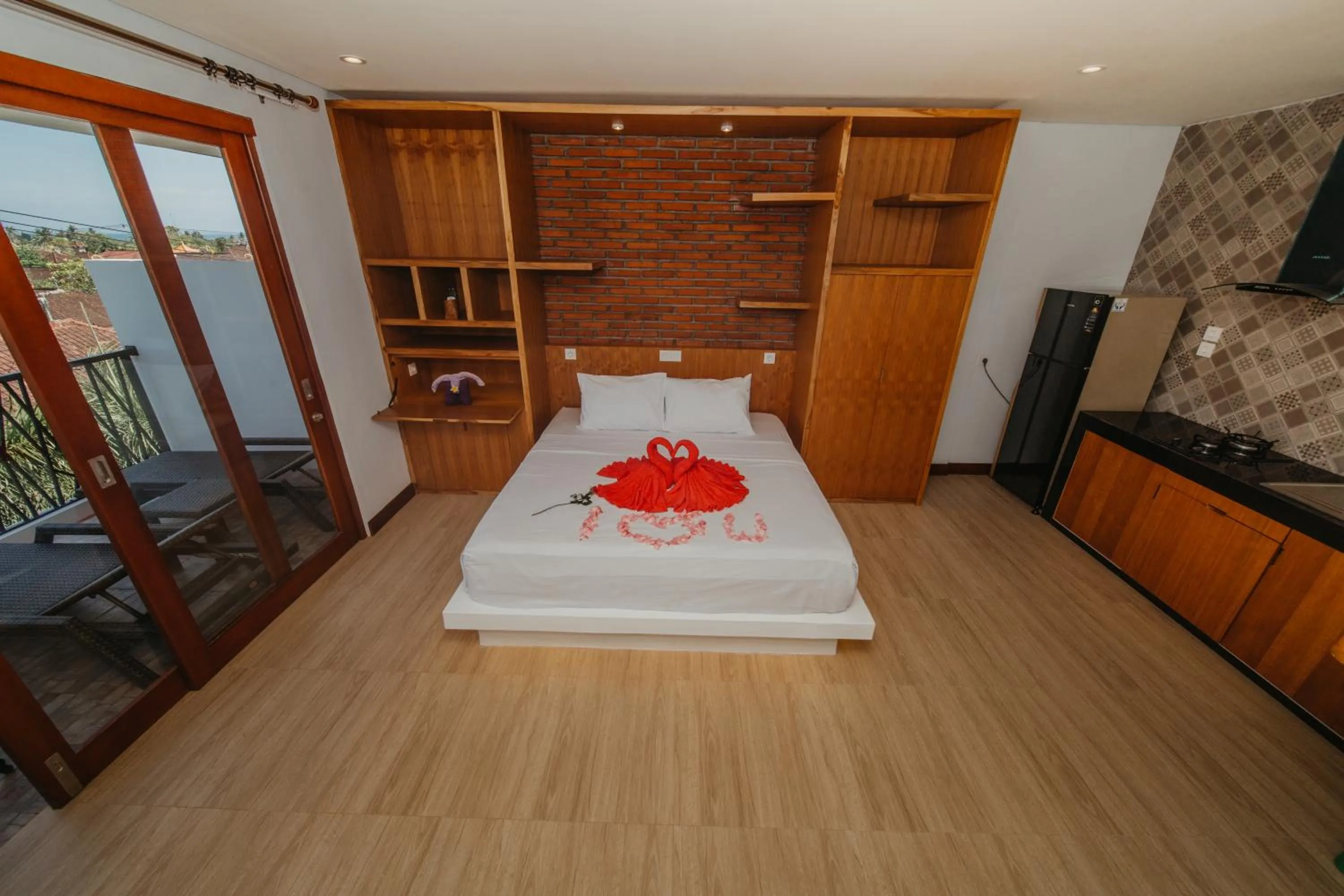 Bed in Kaen Apartments