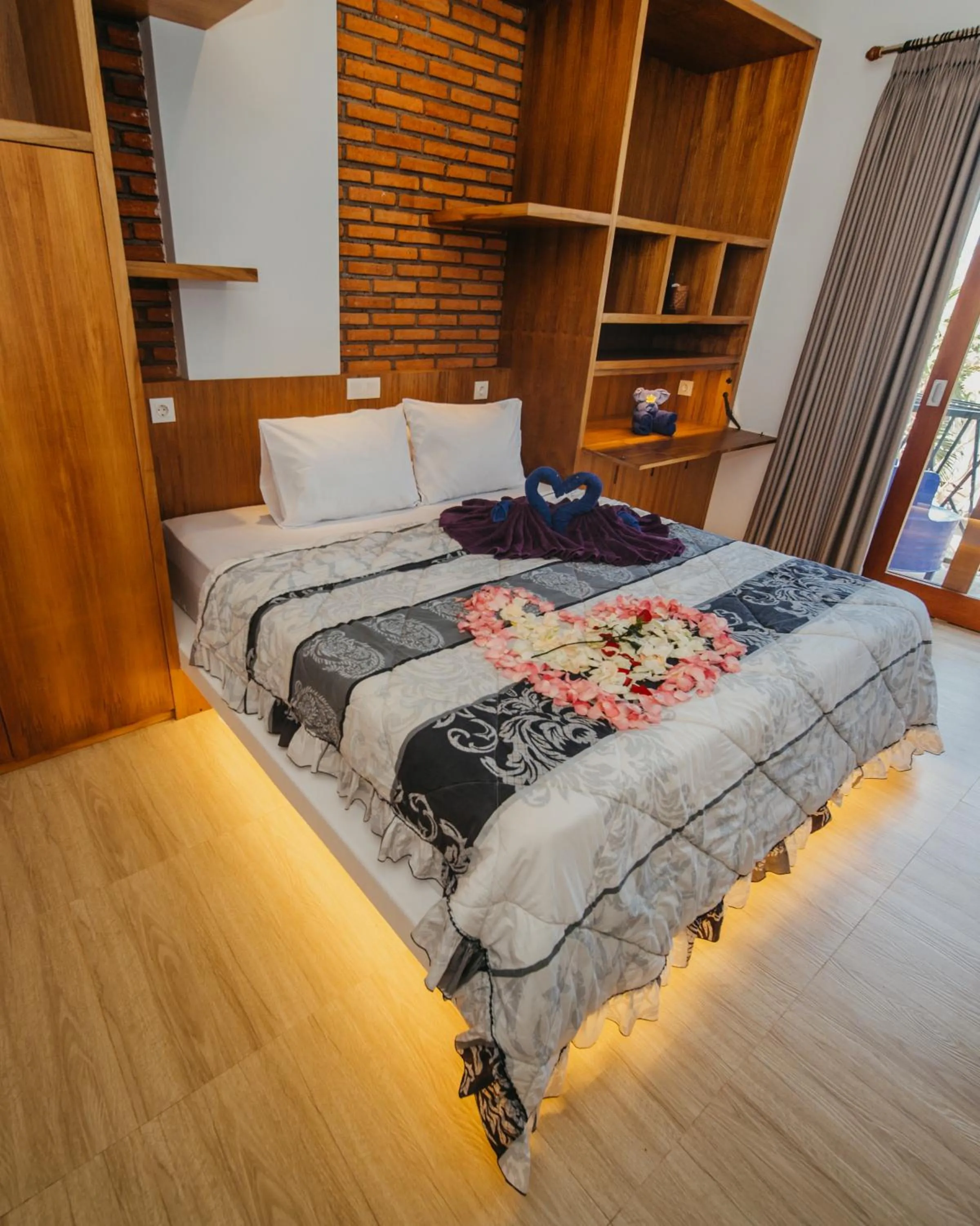 Bed in Kaen Apartments