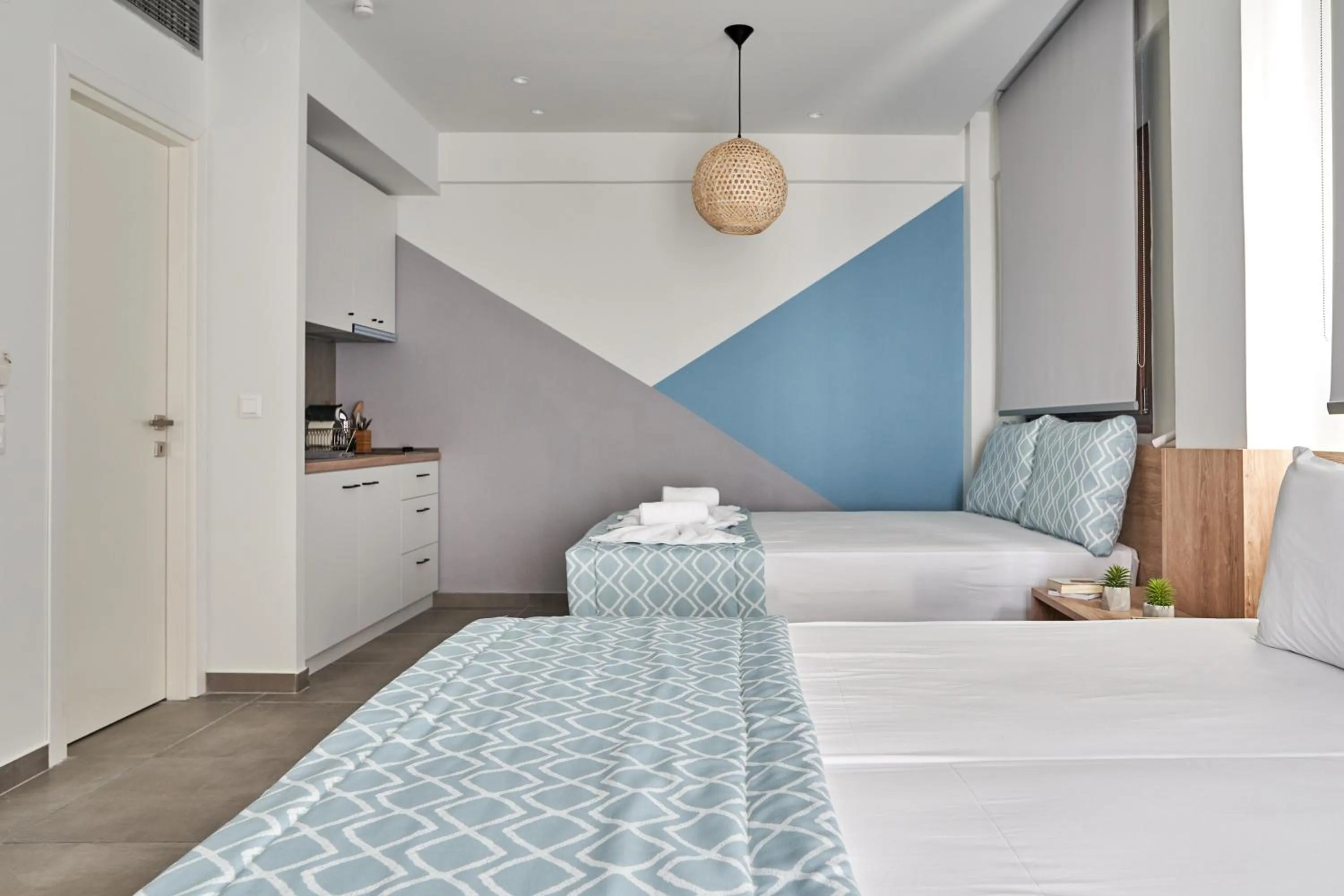 Photo of the whole room, Bed in Mougre studios