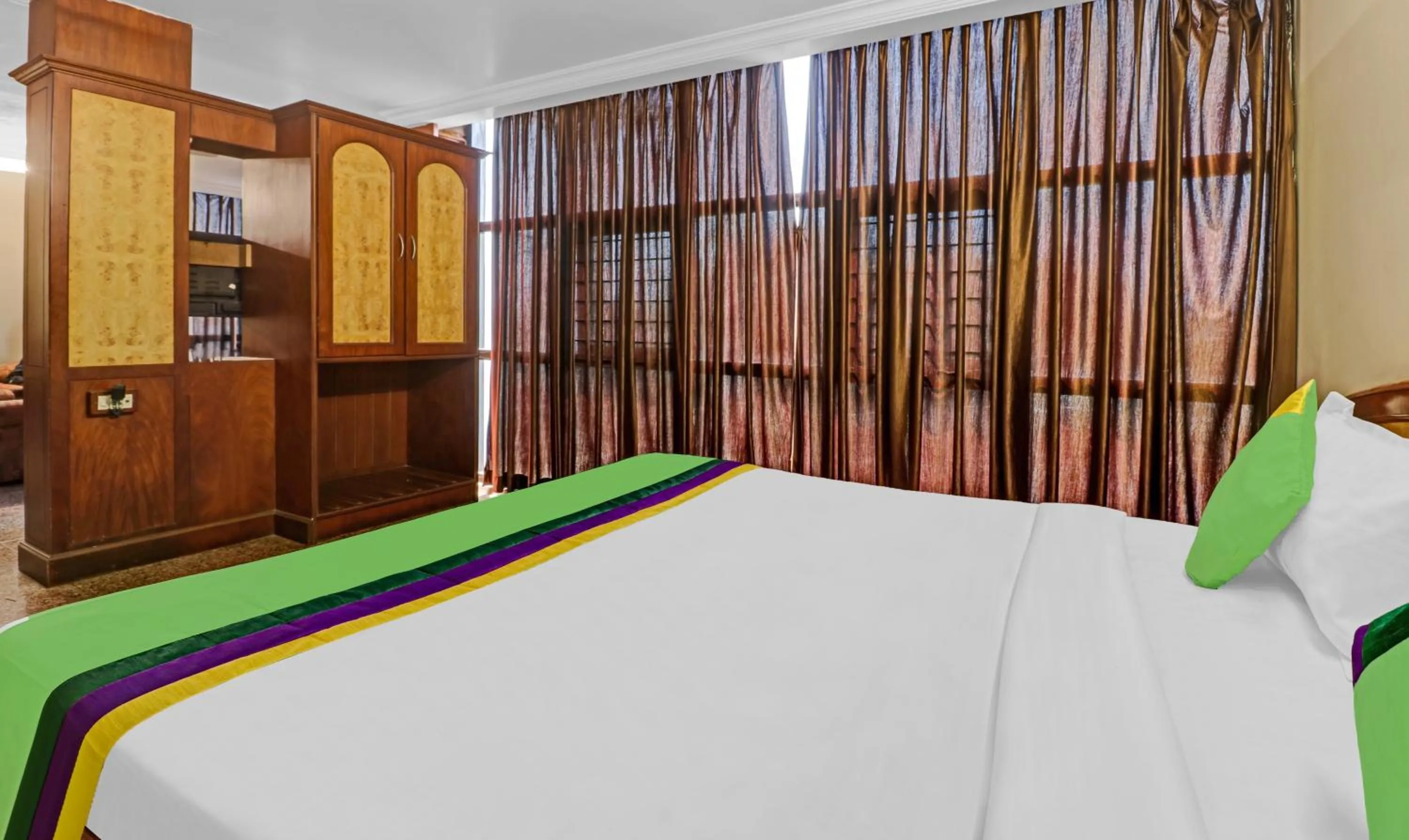 Bedroom, Bed in Treebo Surya Yatri Niwas