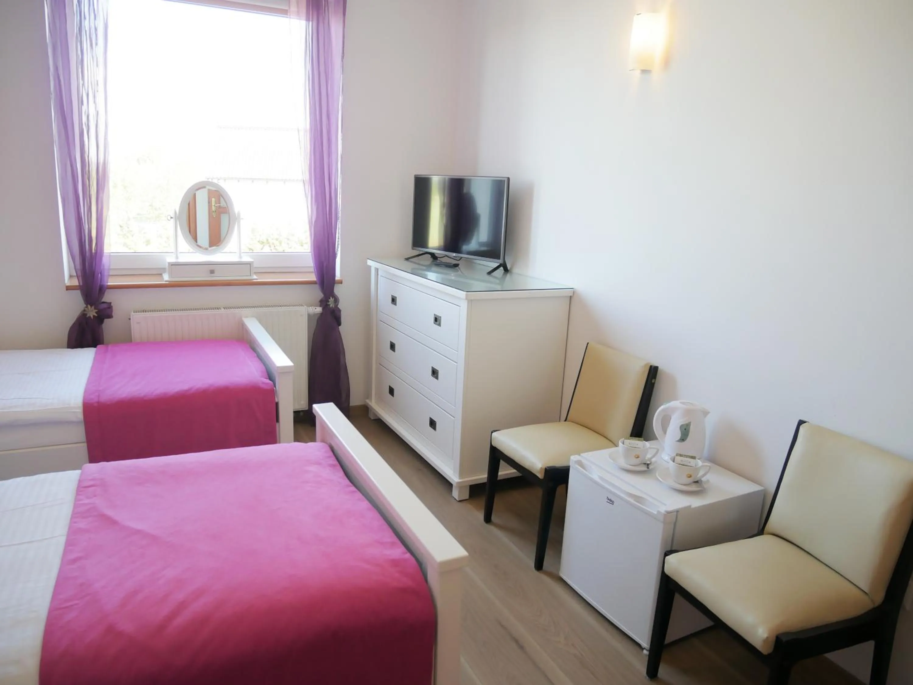 TV and multimedia in Słoneczny Dom pokoje i apartament na wynajem