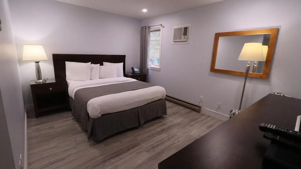 Bed in Algonquin Lakeside Inn