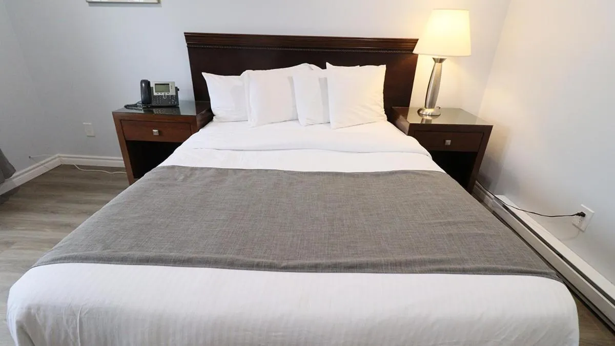 Bed in Algonquin Lakeside Inn