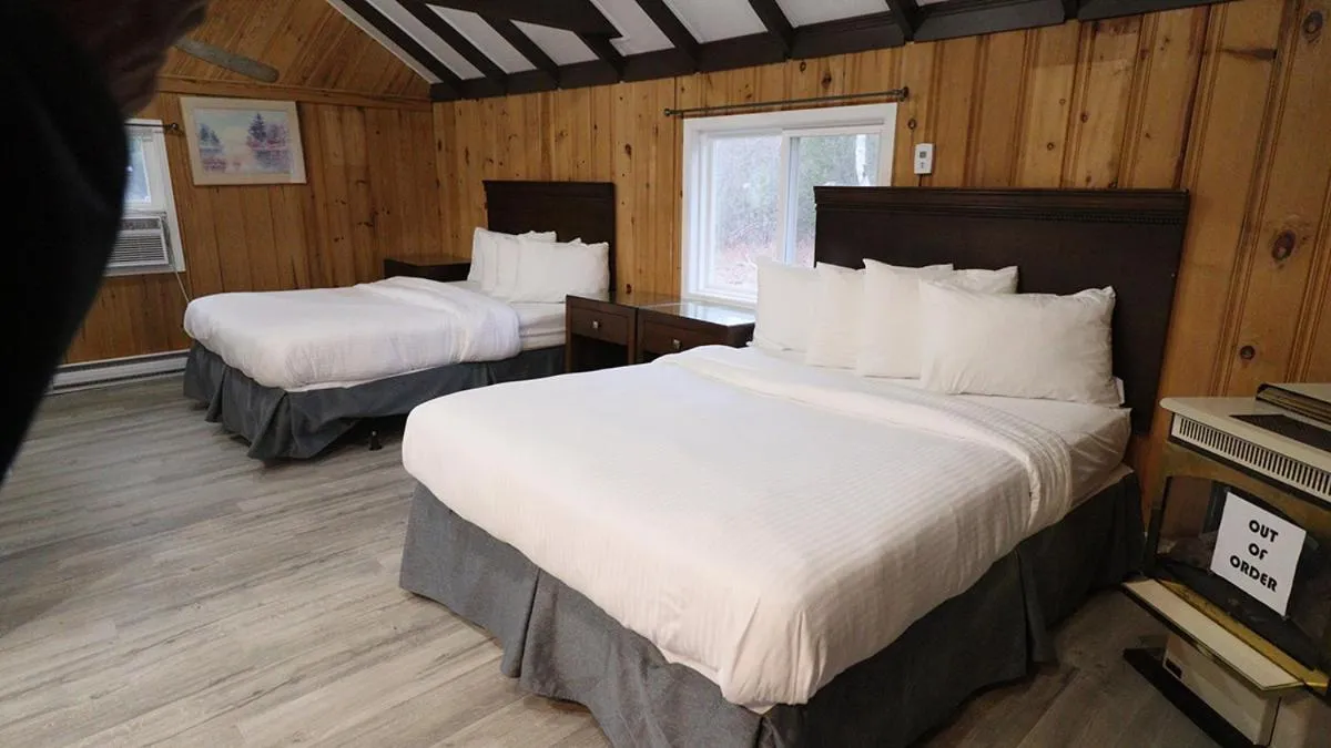 Bed in Algonquin Lakeside Inn