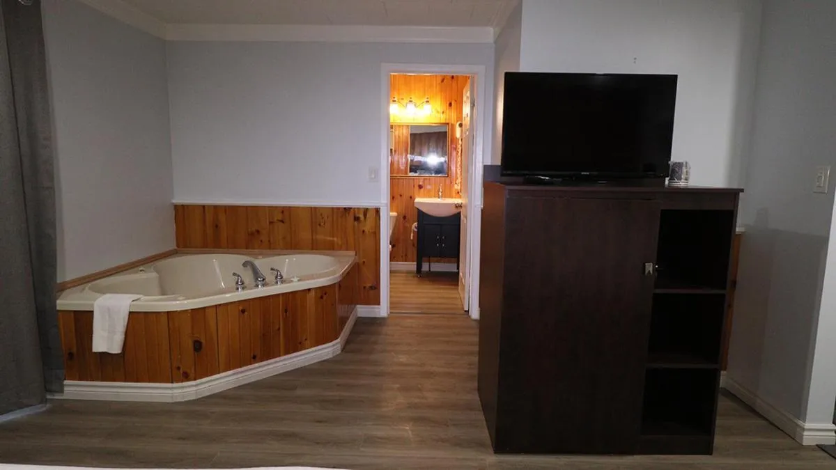 Bed in Algonquin Lakeside Inn